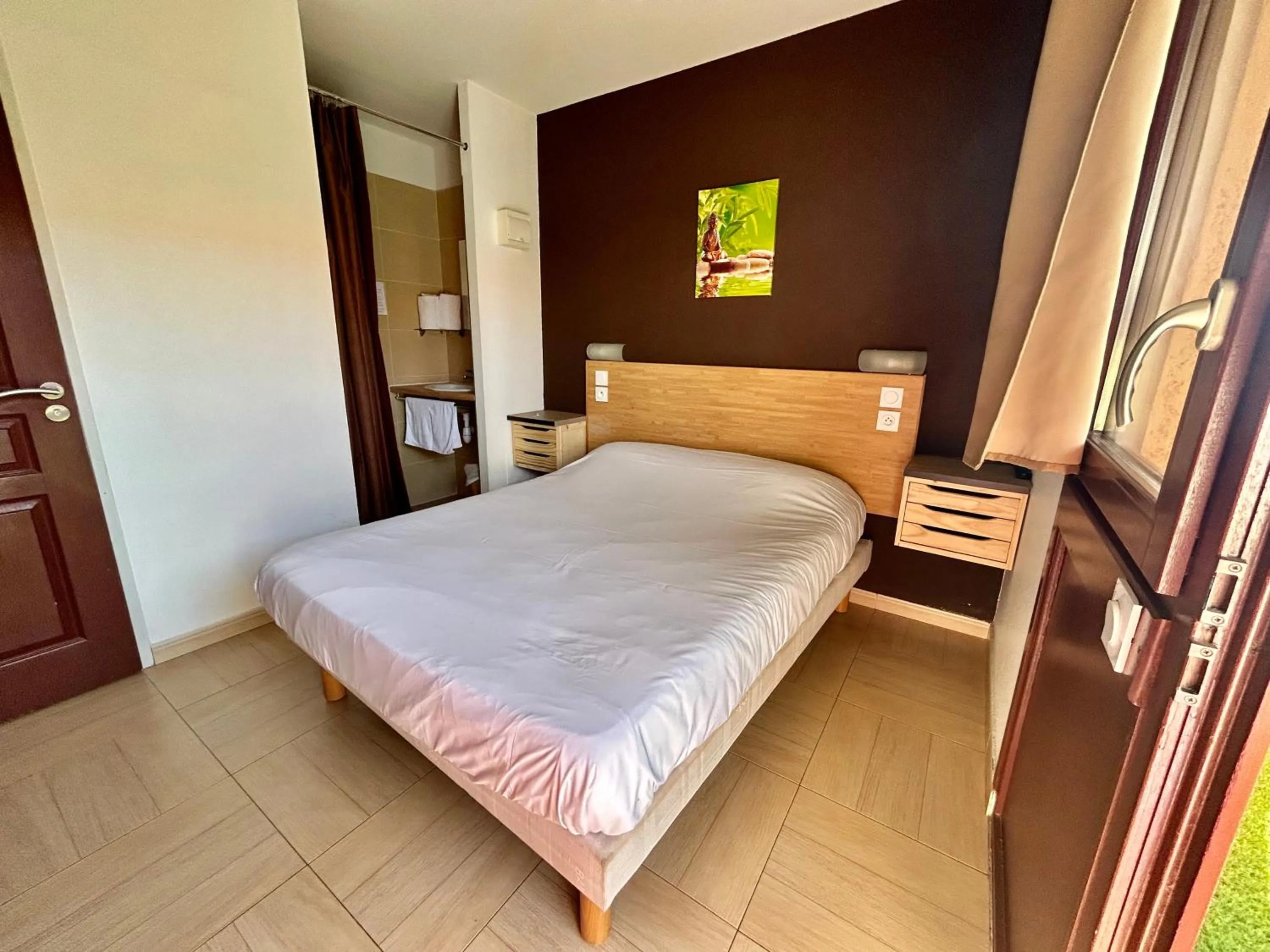 Bed in Hôtel Acajou