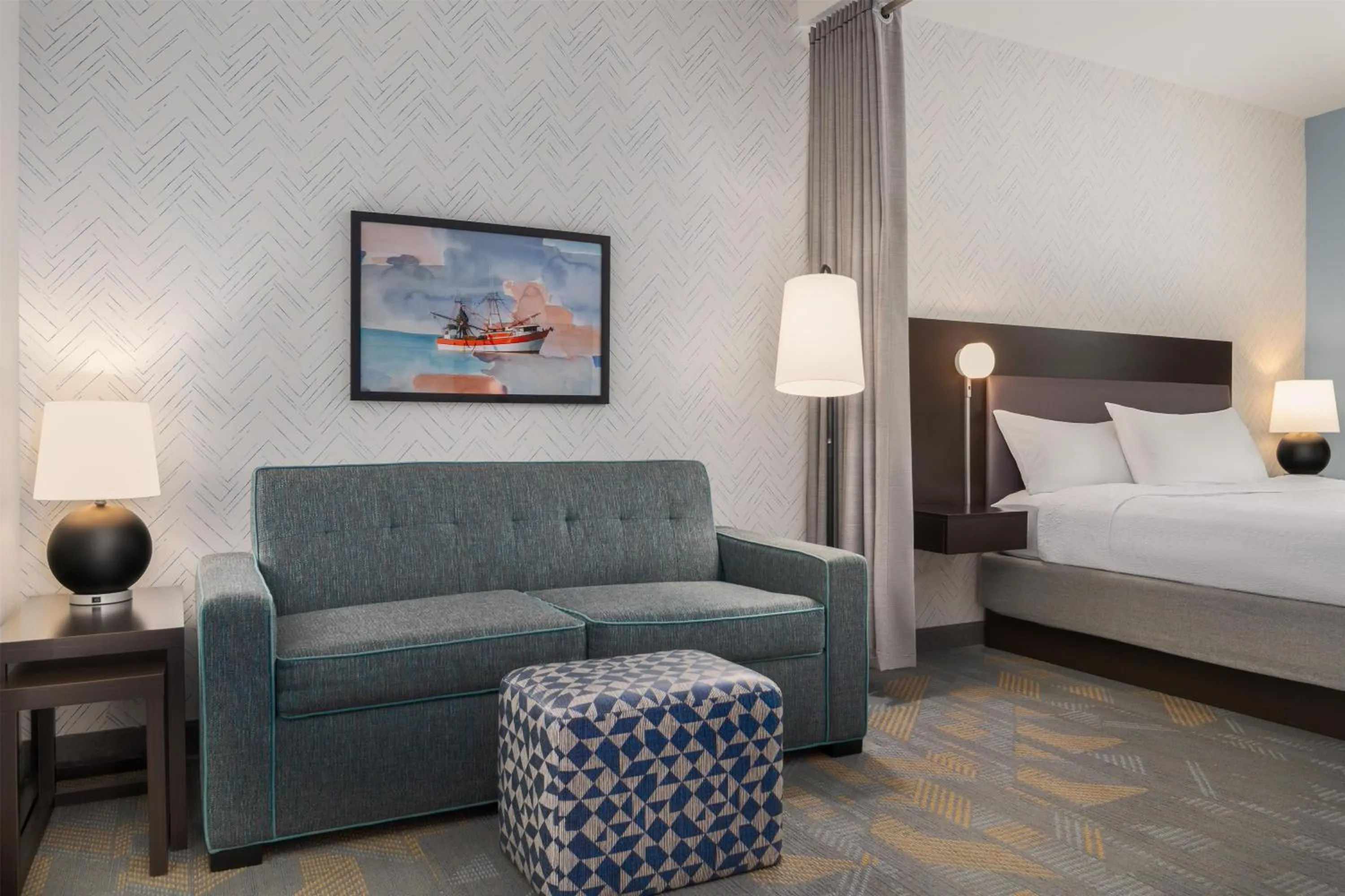 Living room, Bed in Home2 Suites by Hilton Biloxi/North/D'Iberville