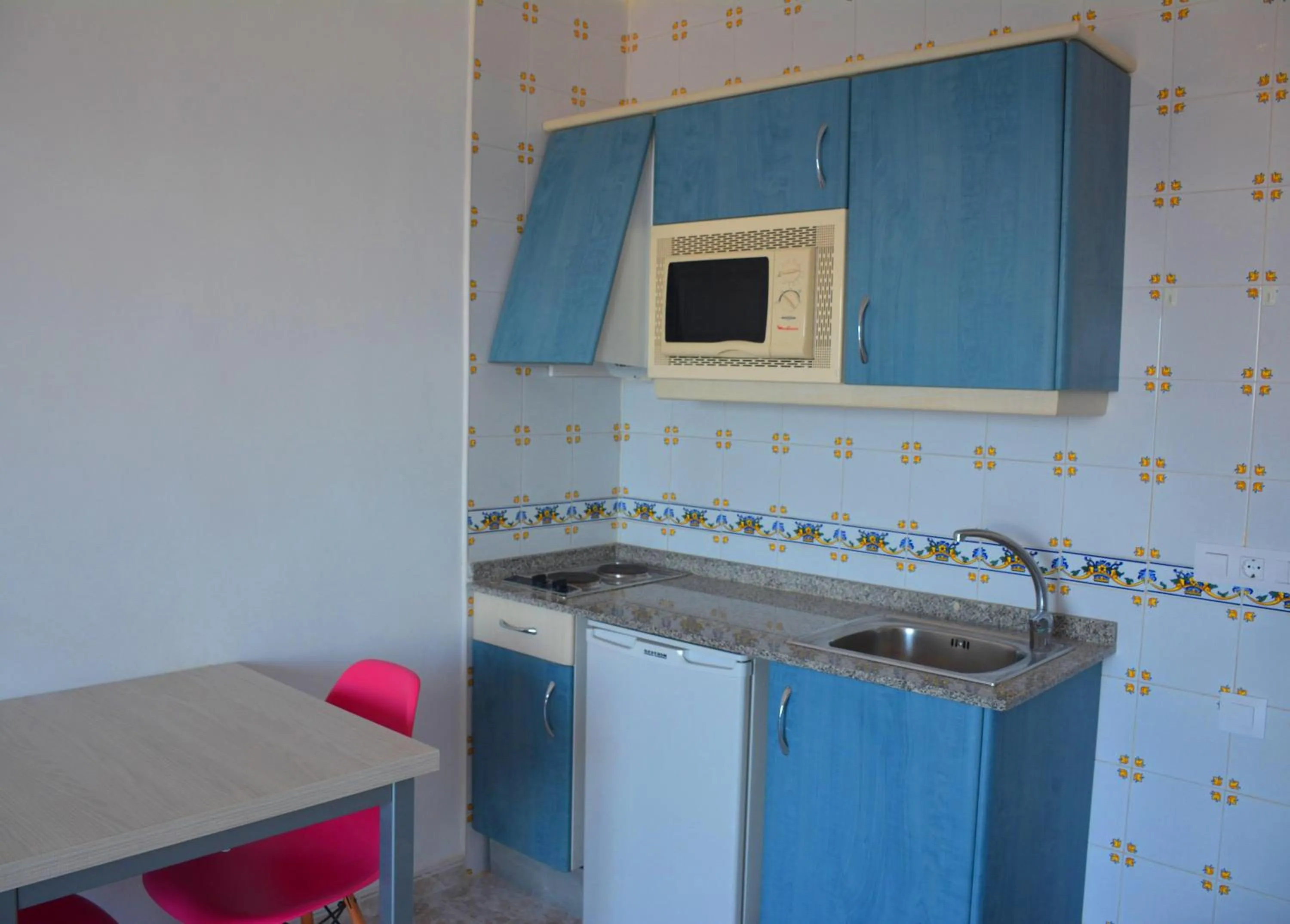 kitchen in Apartamentos Playa Moreia
