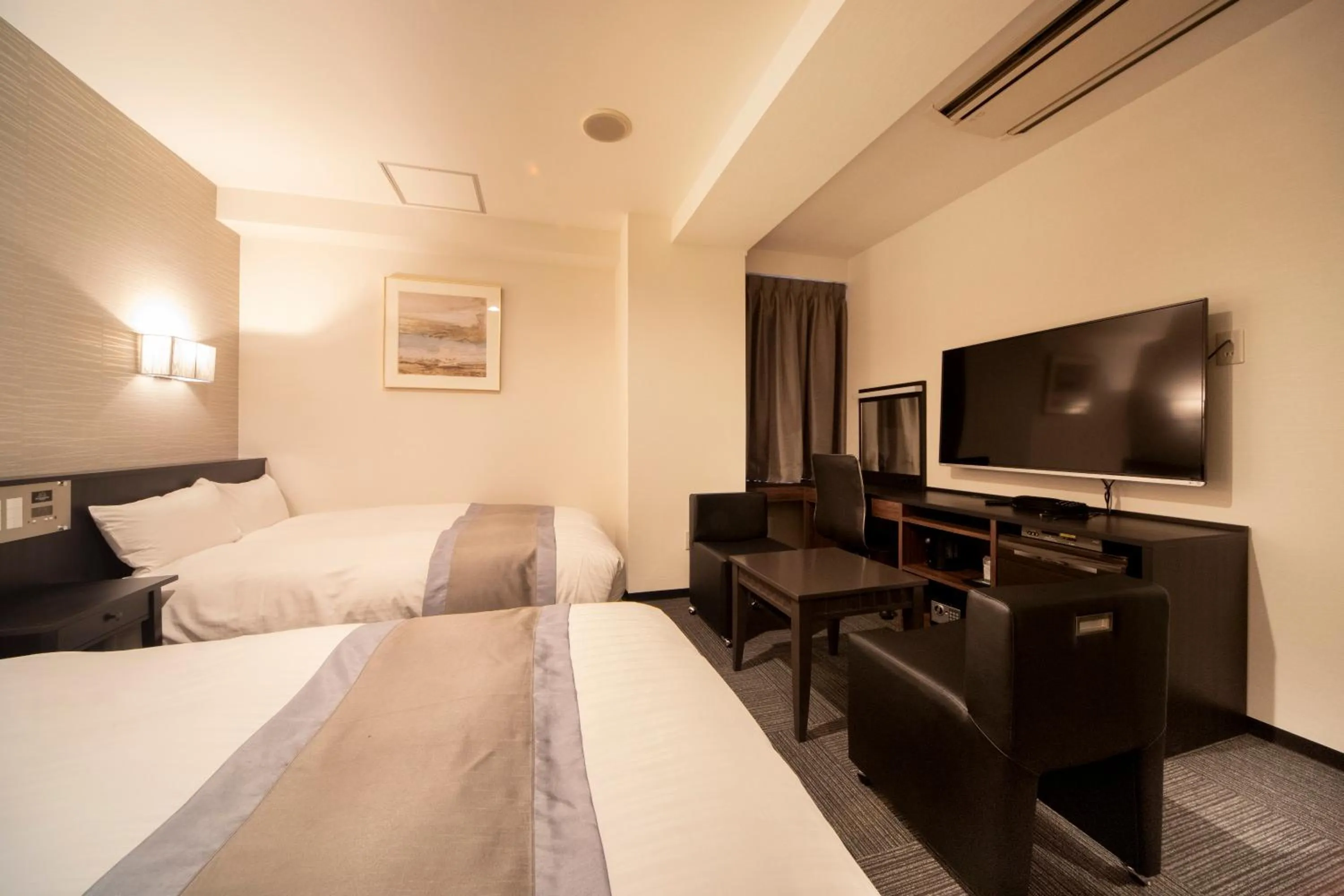 Bed in The Grandeur Hotel