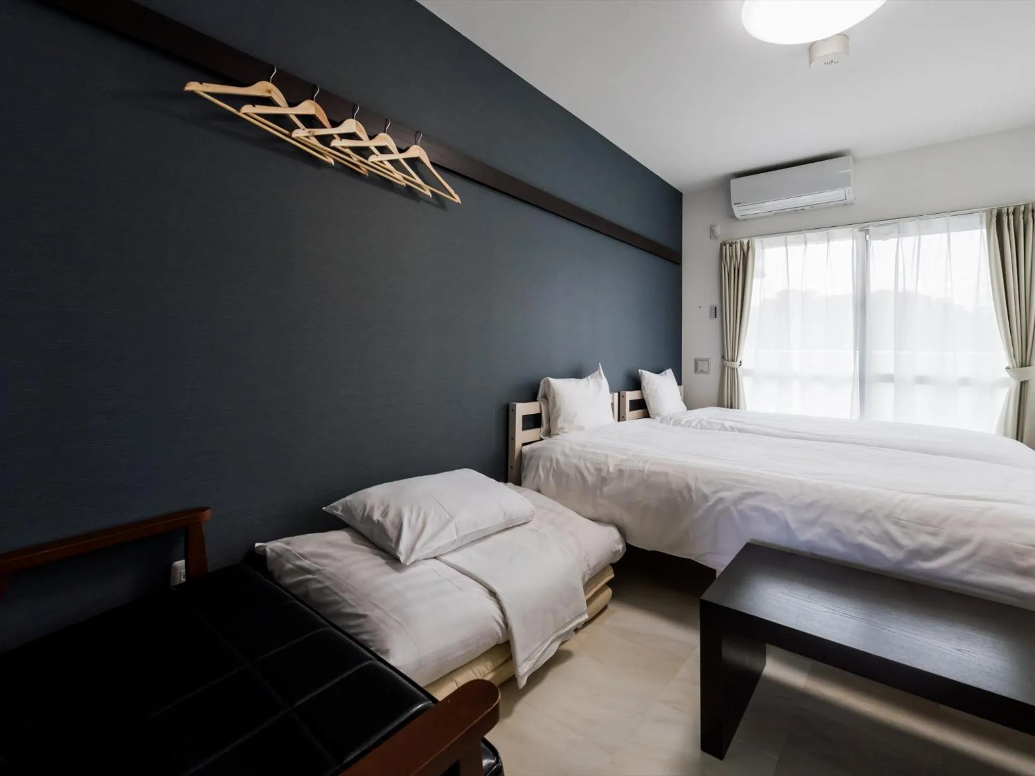 Bed in Hotel Tomas Nago