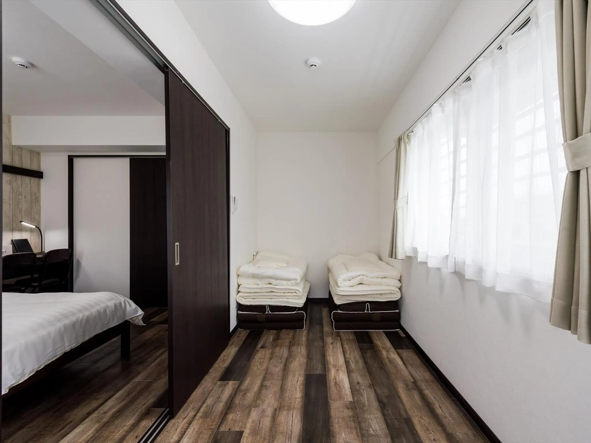 Bed in Hotel Tomas Nago