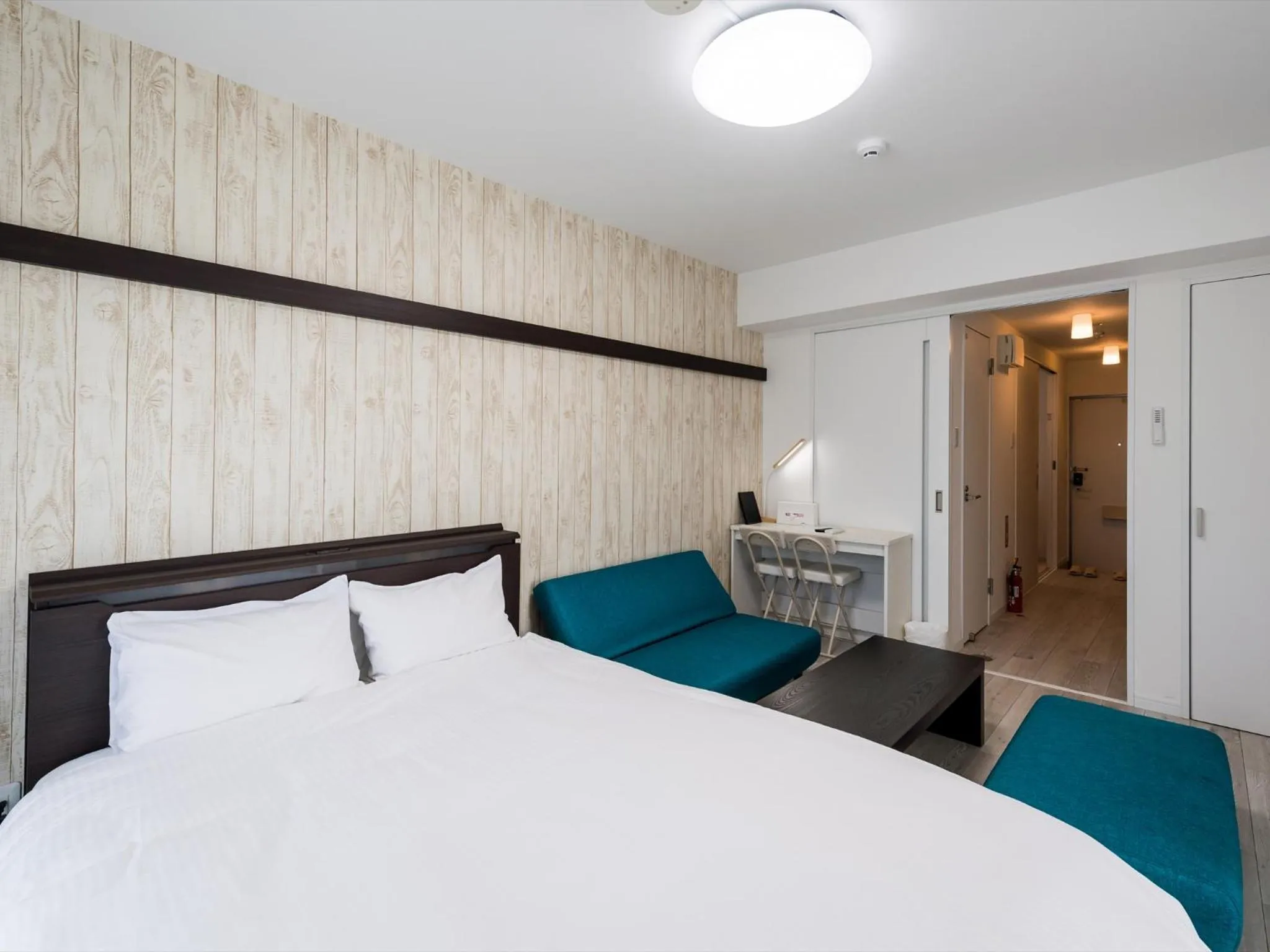 Bed in Hotel Tomas Nago