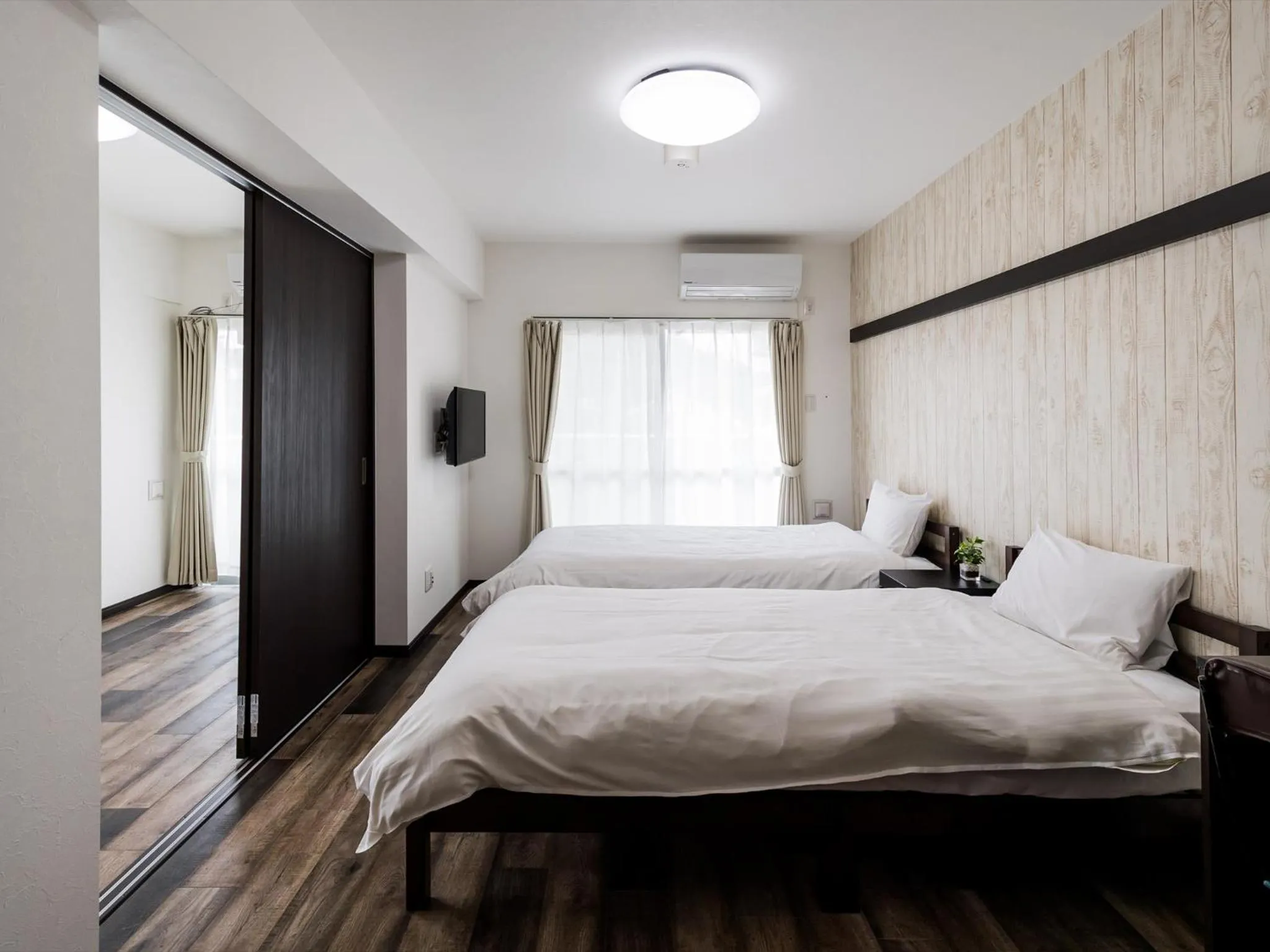 Bed in Hotel Tomas Nago