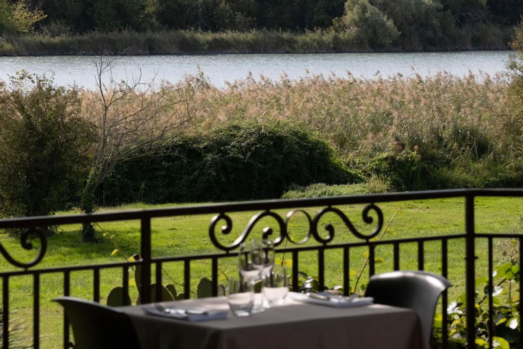 Patio in Logis Hôtel Les Vieilles Granges