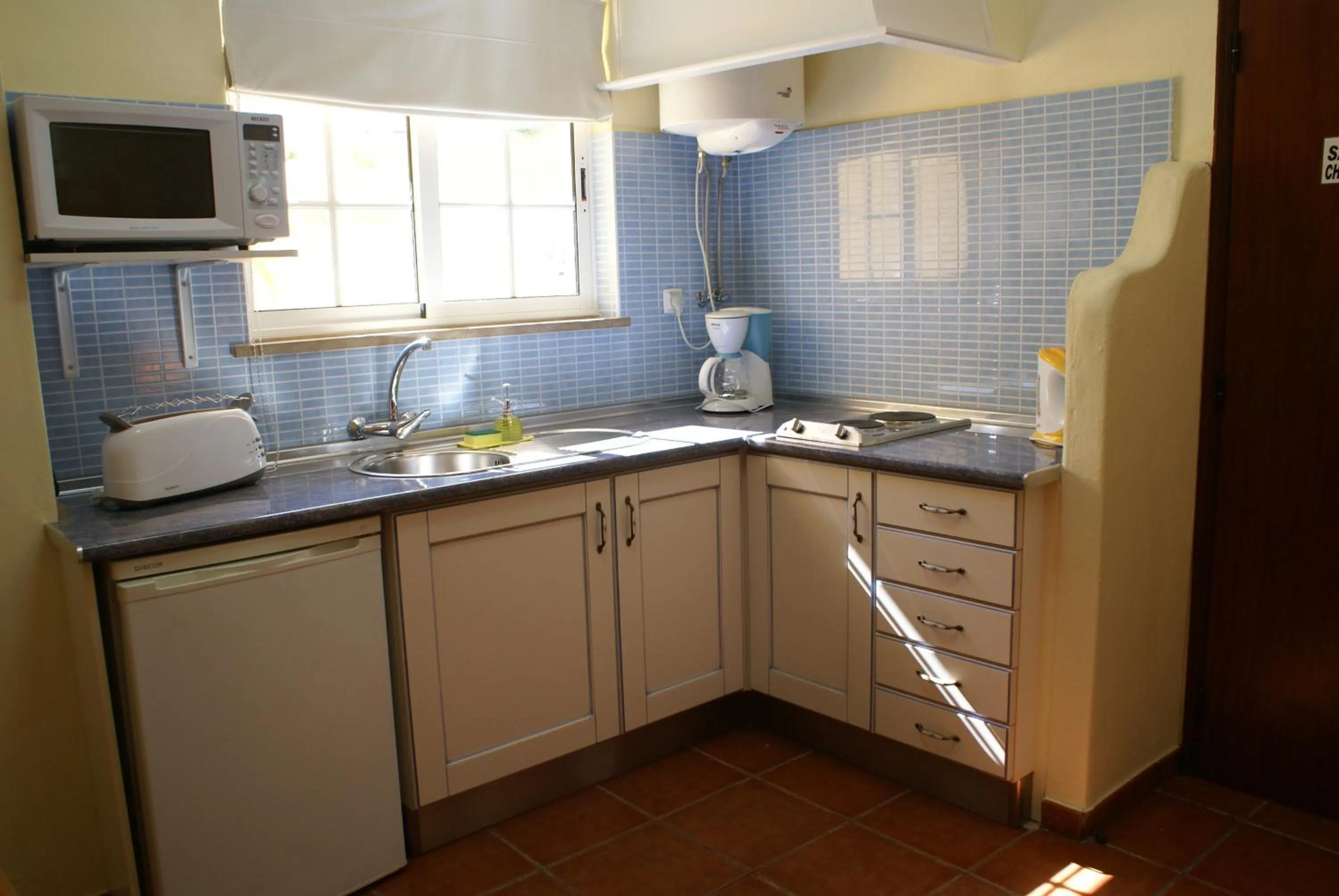 Kitchen or kitchenette in Casa Paula Apartments