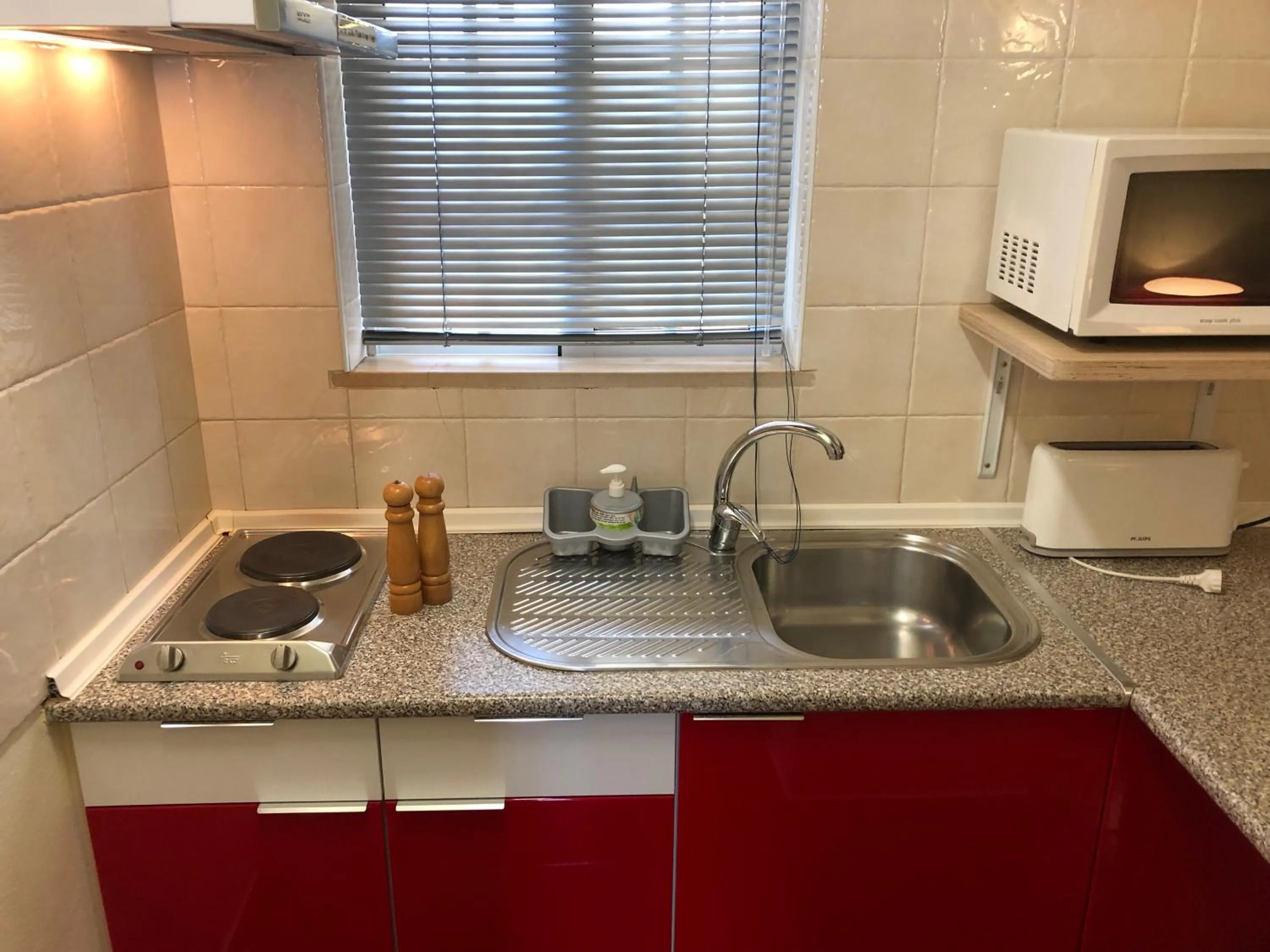 Kitchen or kitchenette in Casa Paula Apartments