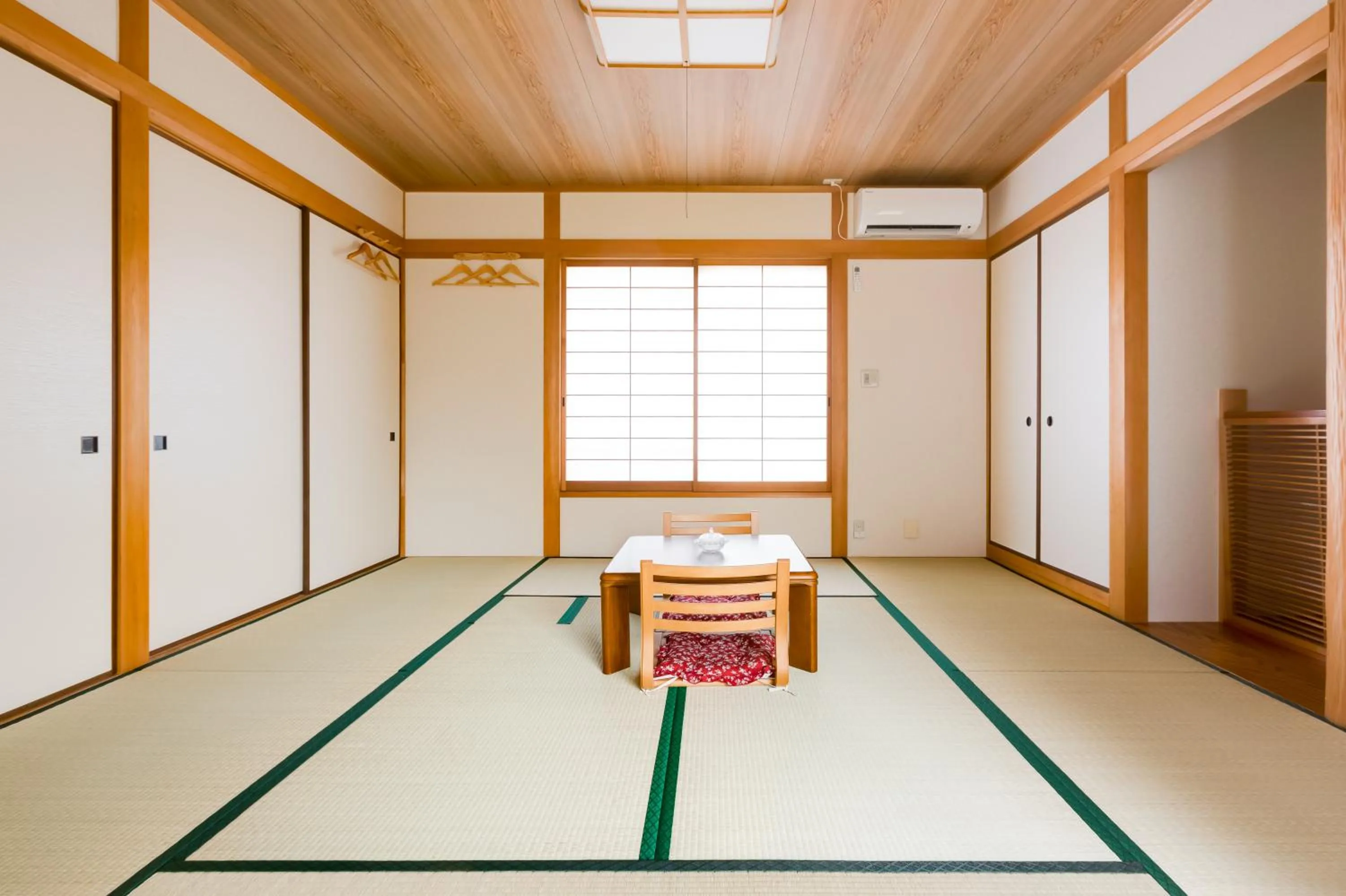 Bed in PLUS 9 Station INN