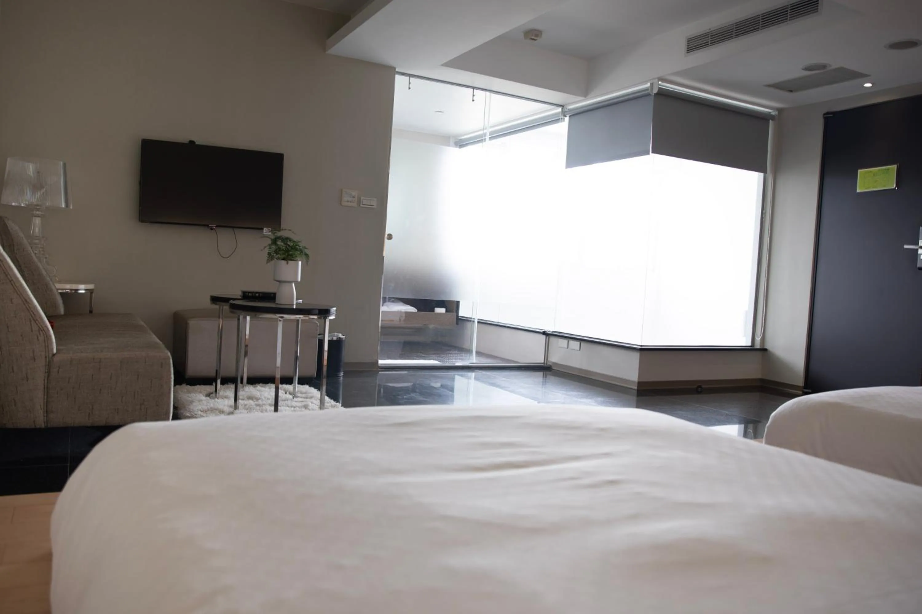 Photo of the whole room, Bed in Kapok Hotel & Resorts