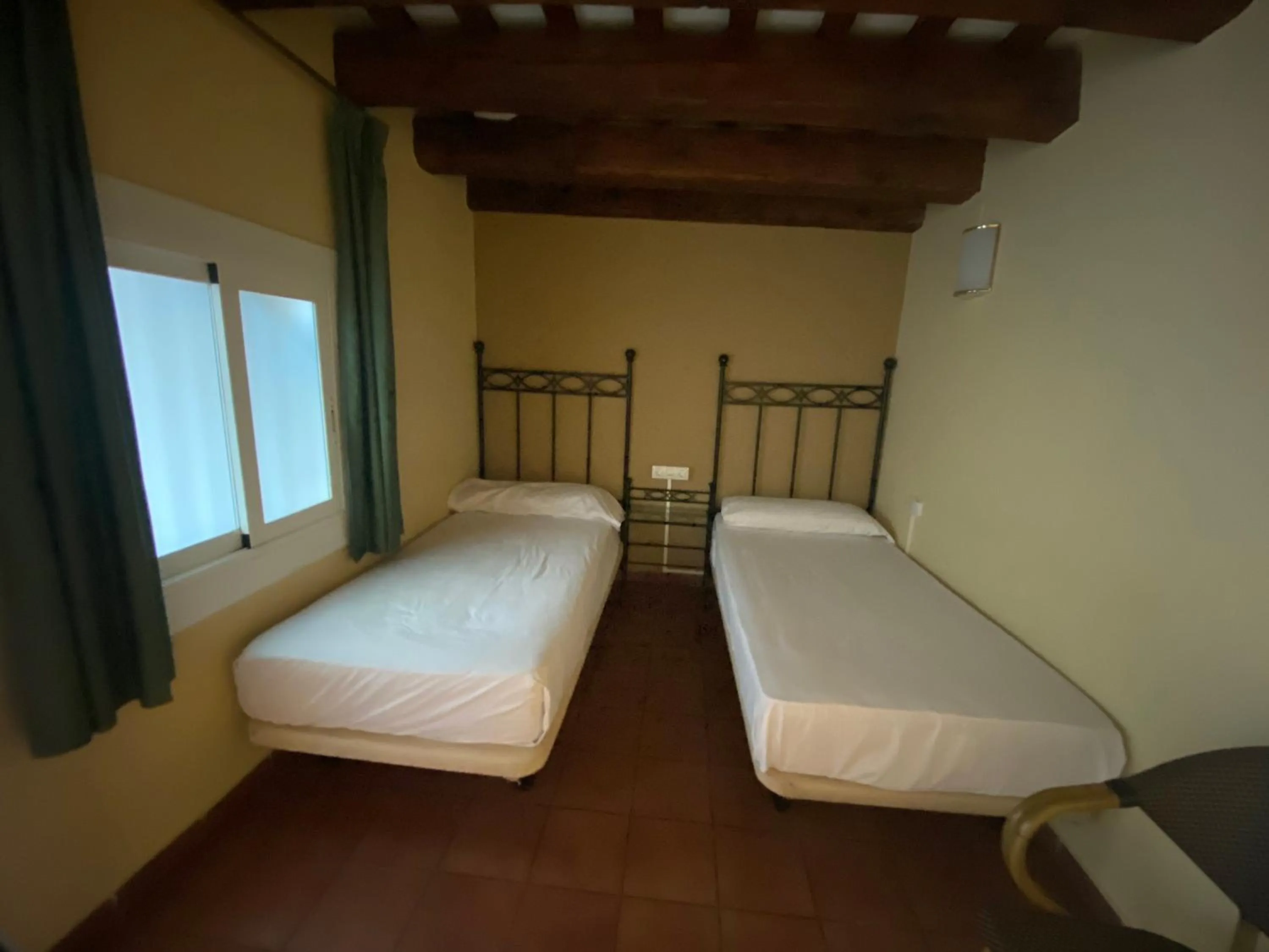 Bed in Hotel Peninsular