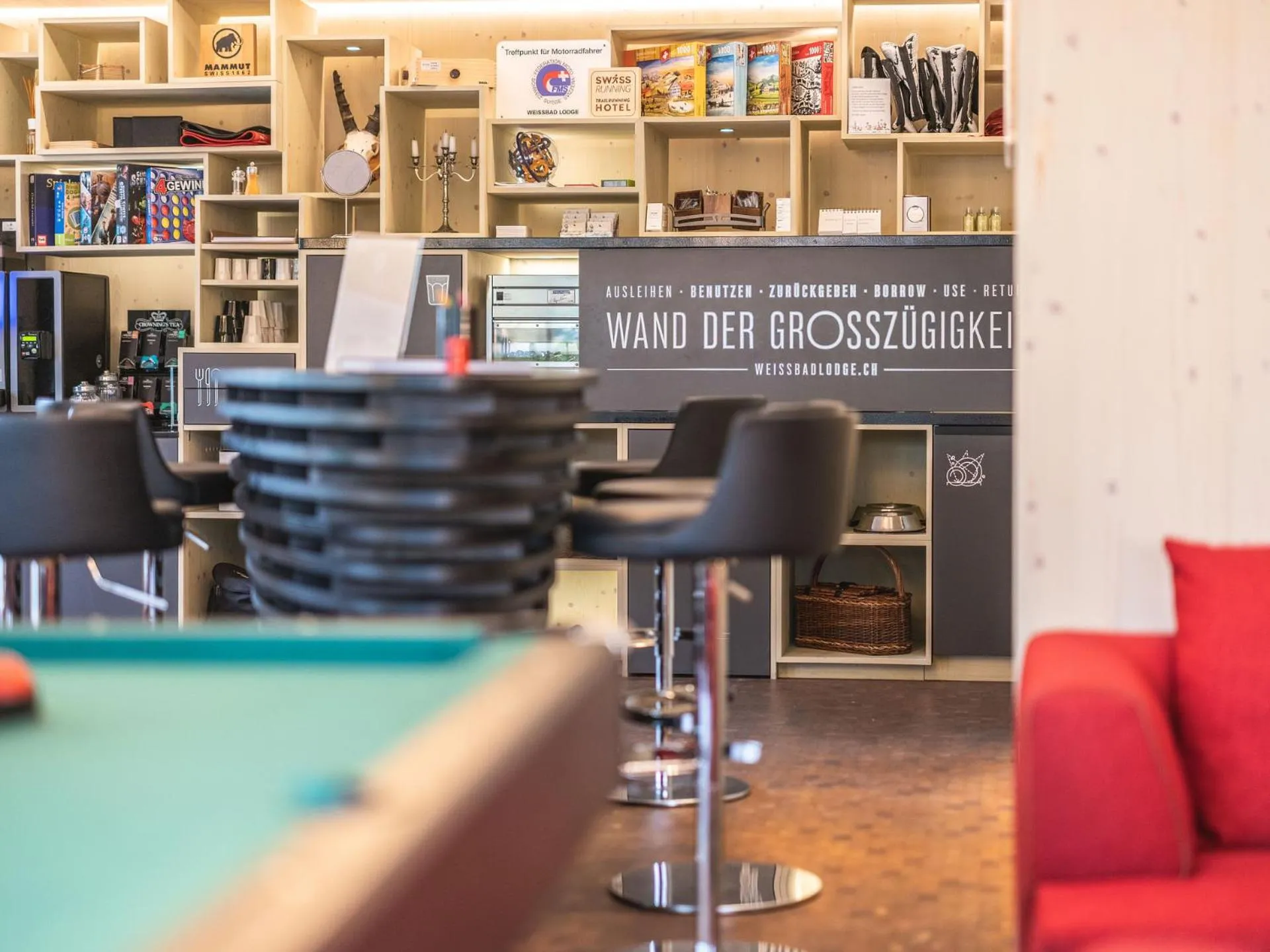 Communal lounge/ TV room in Lodge Hof Weissbad