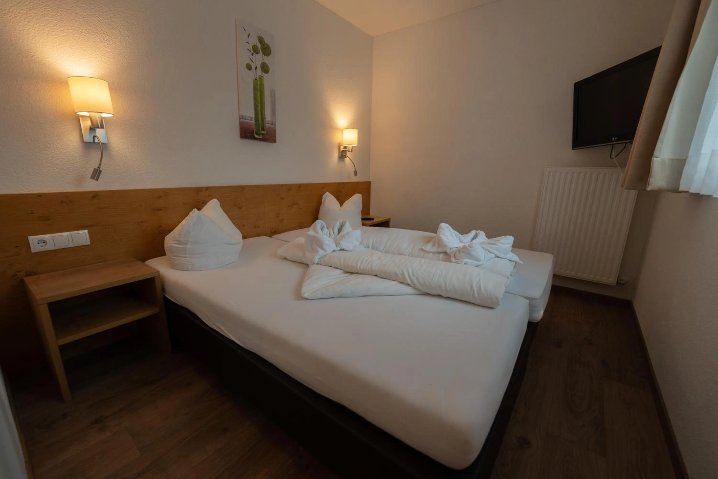 Bed in Alpenhotel Regina