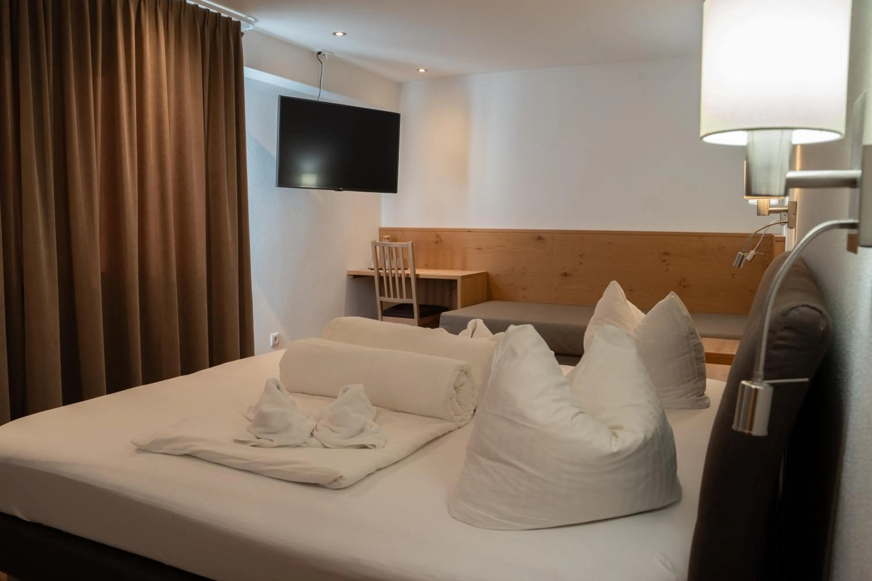 Photo of the whole room, Bed in Alpenhotel Regina