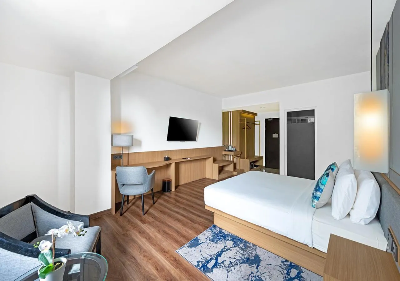 Photo of the whole room, Bed in Oakwood Hotel & Apartments Taman Mini Jakarta