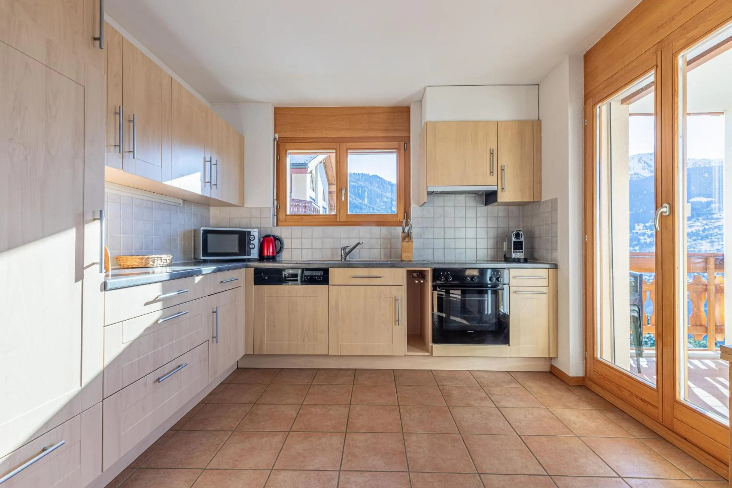 Kitchen or kitchenette in Myosotis QUIET & SUNNY apartments by Alpvision Résidences by Alpvision Résidences