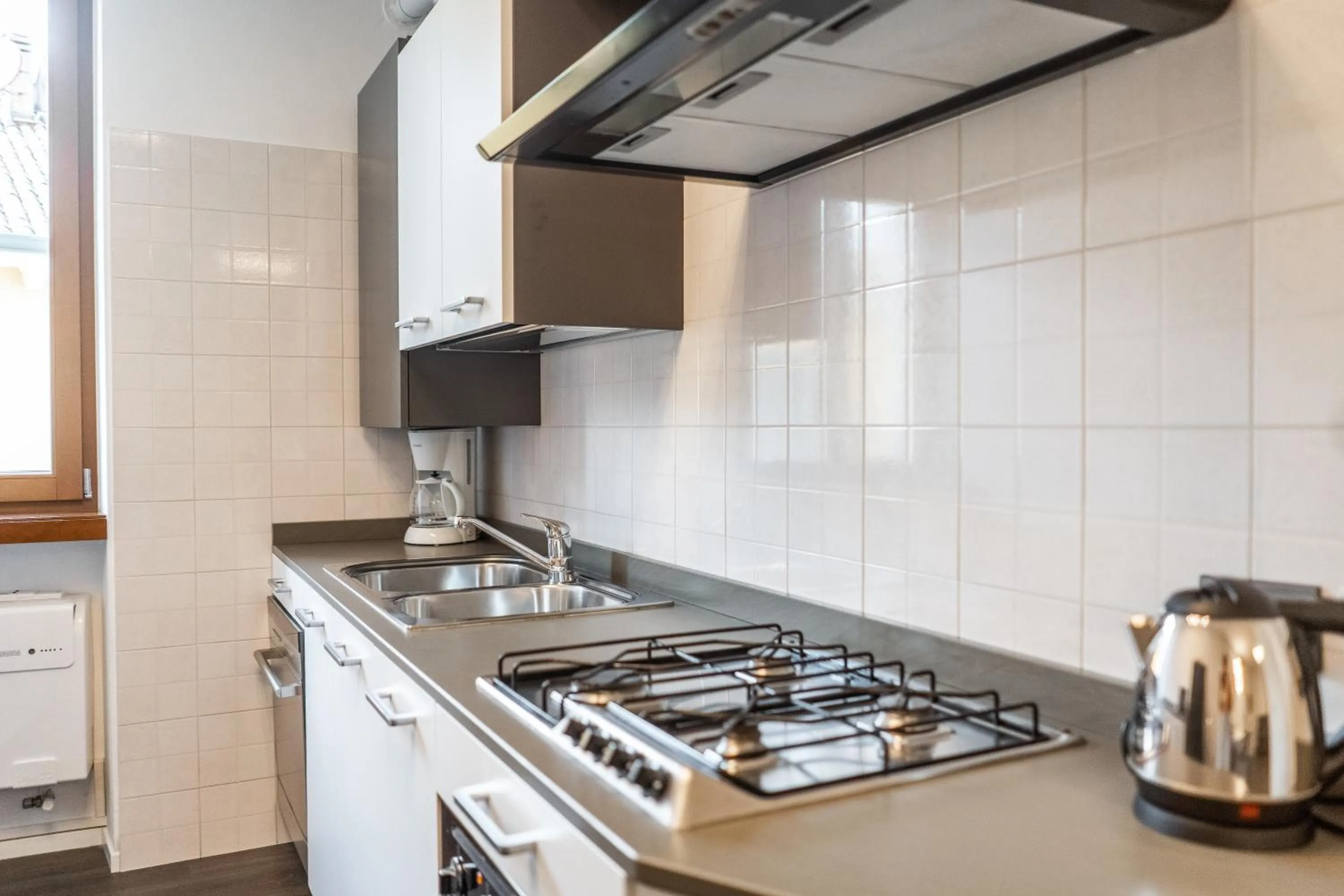 Kitchen or kitchenette in Appartamenti Vasco Renna Surf Center