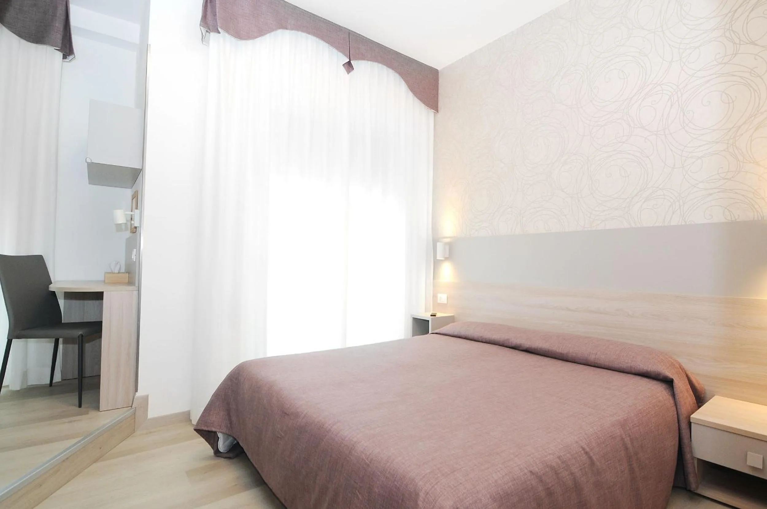 Bed in Hotel Da Mario