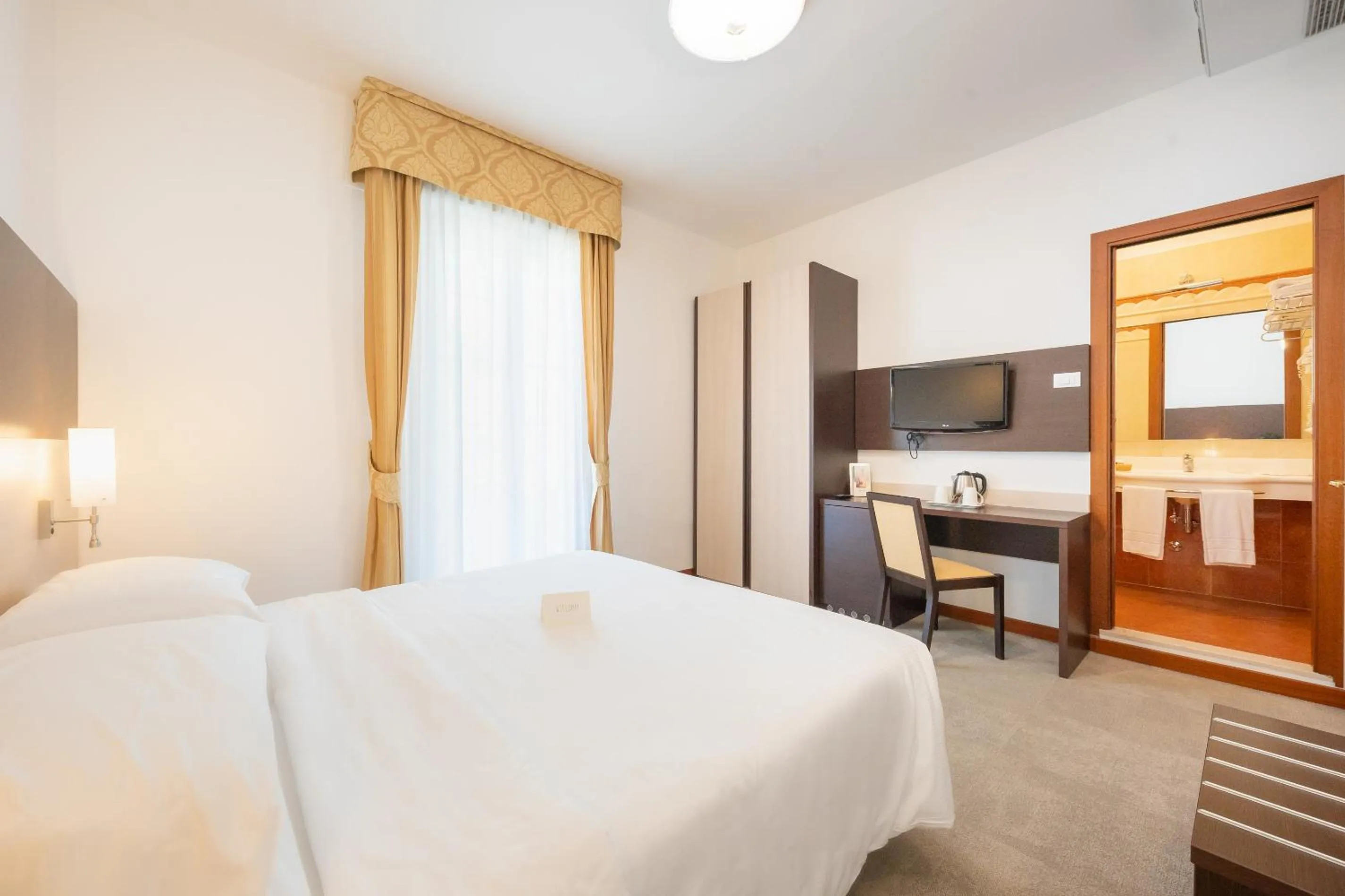 Bed in Park Hotel Pineta Boutique Hotel