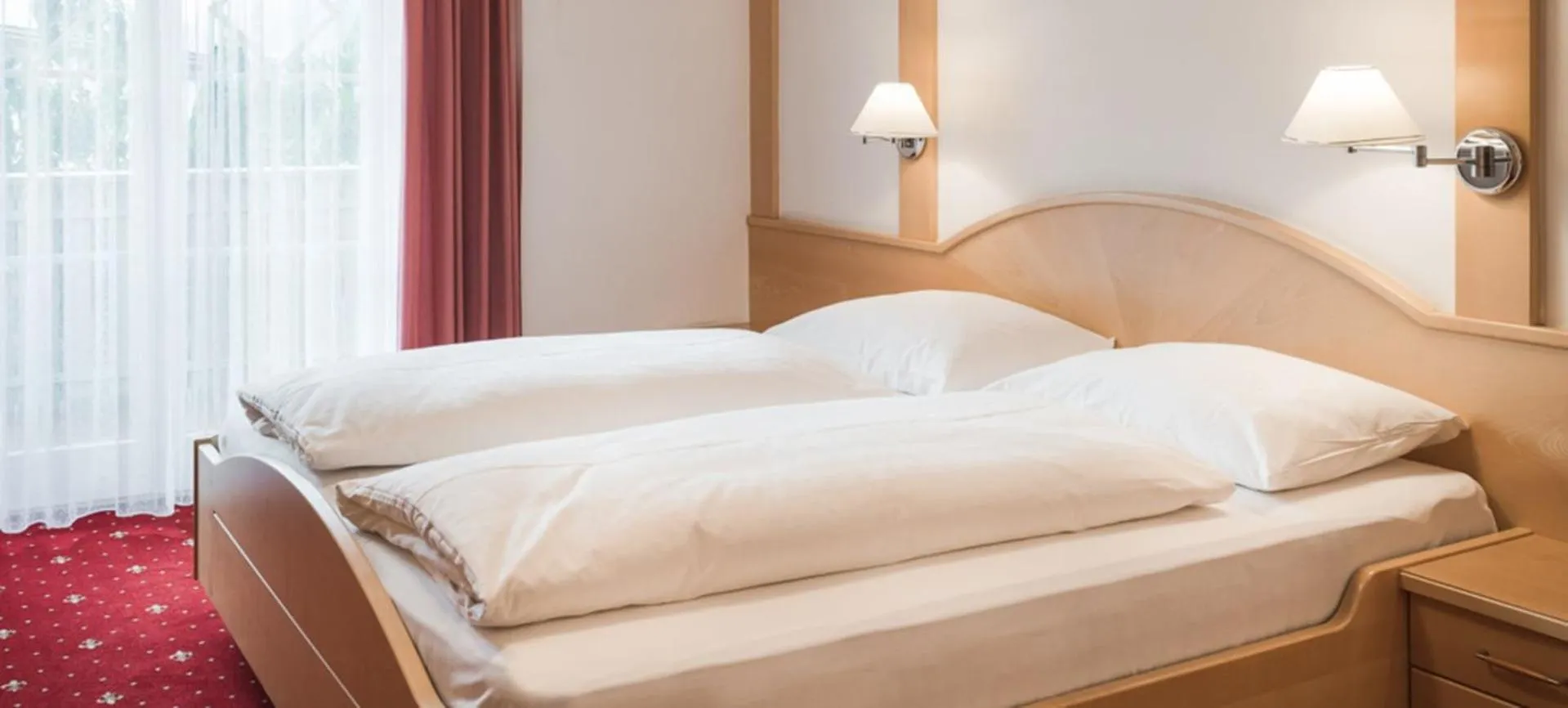 Photo of the whole room, Bed in Parkhotel Plauserhof