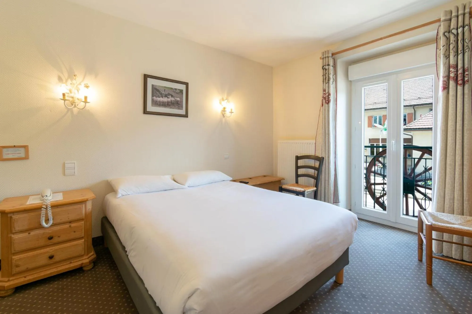 Bed in Hôtel de la Poste