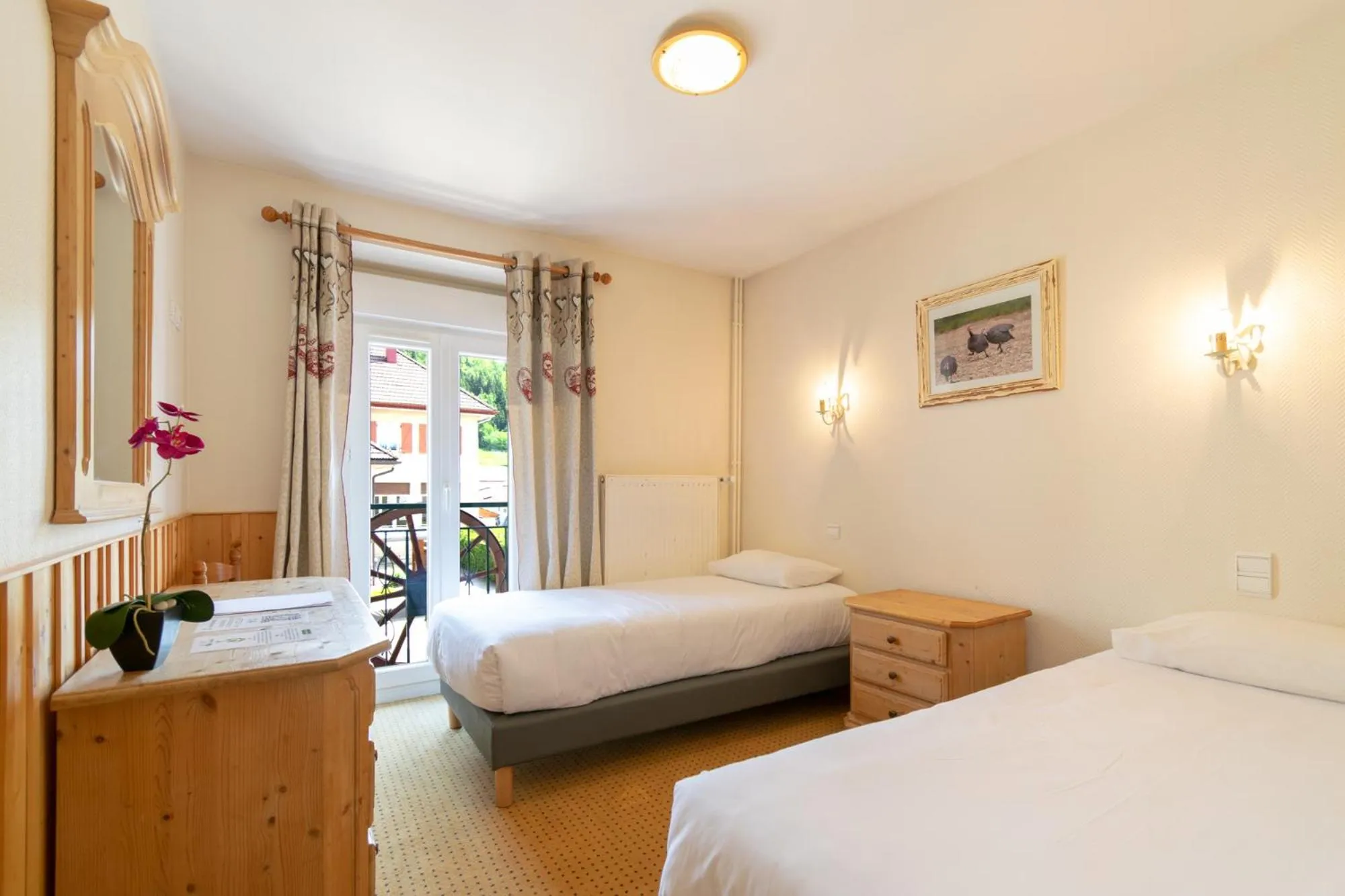 Bed in Hôtel de la Poste