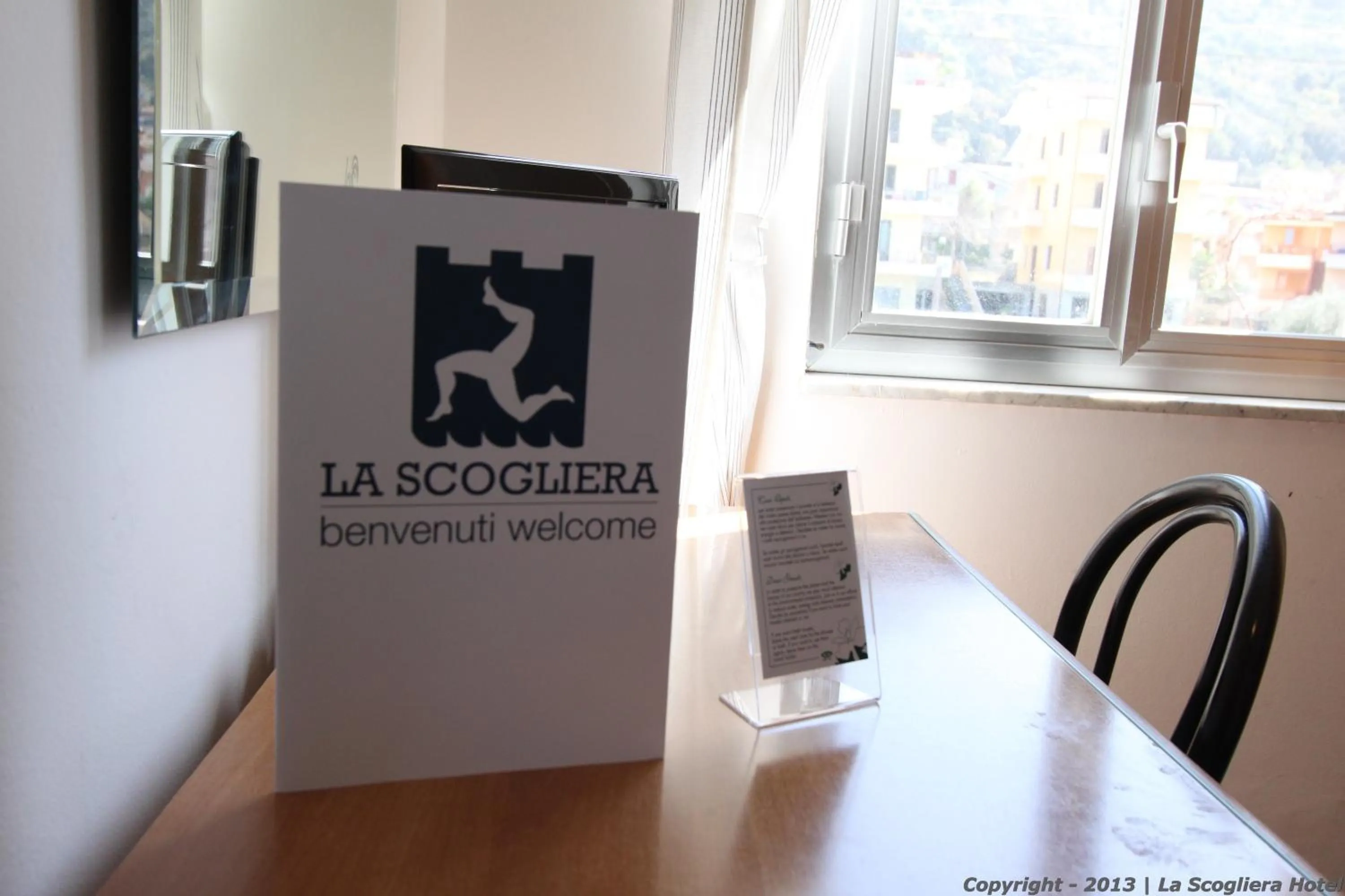 Logo/Certificate/Sign in Hotel Ristorante La Scogliera - NUOVA GESTIONE