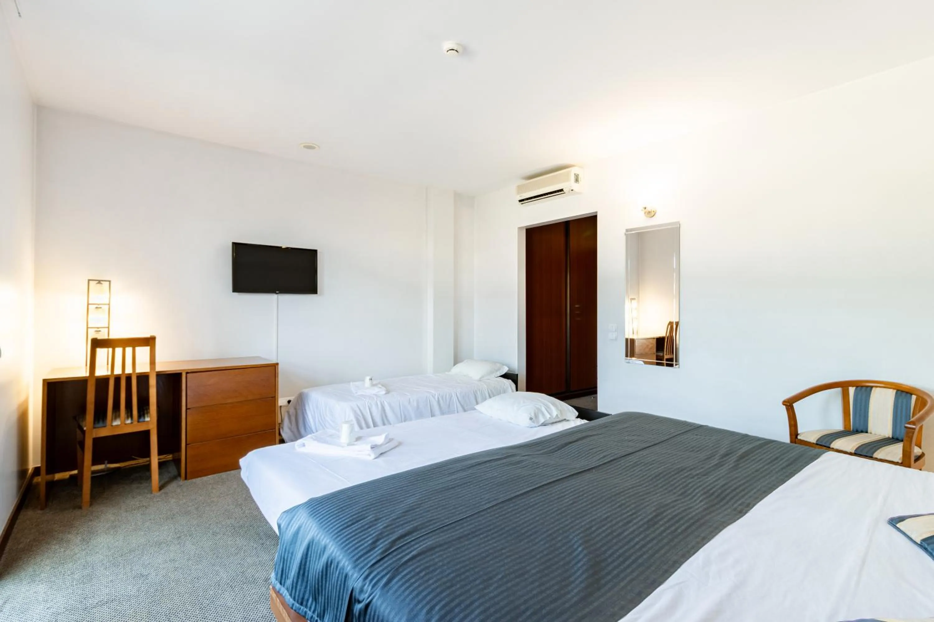 Bed in Hotel La Fontaine