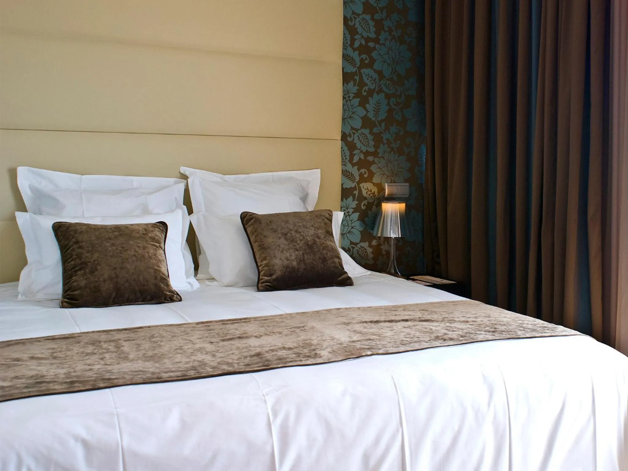 Bed in Lutecia Smart Design Hotel