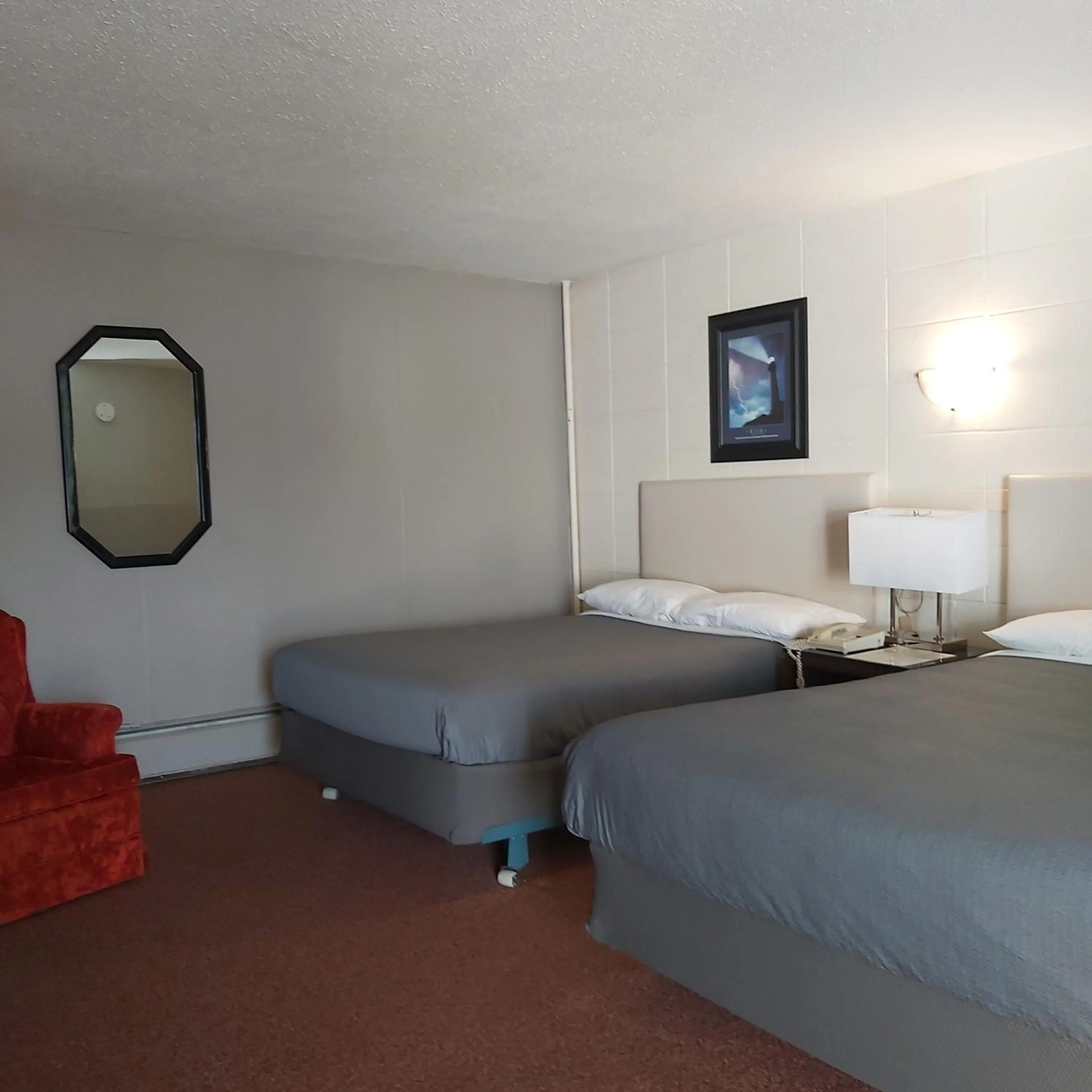 Bed in Alpine Lodge Motel & Restaurant