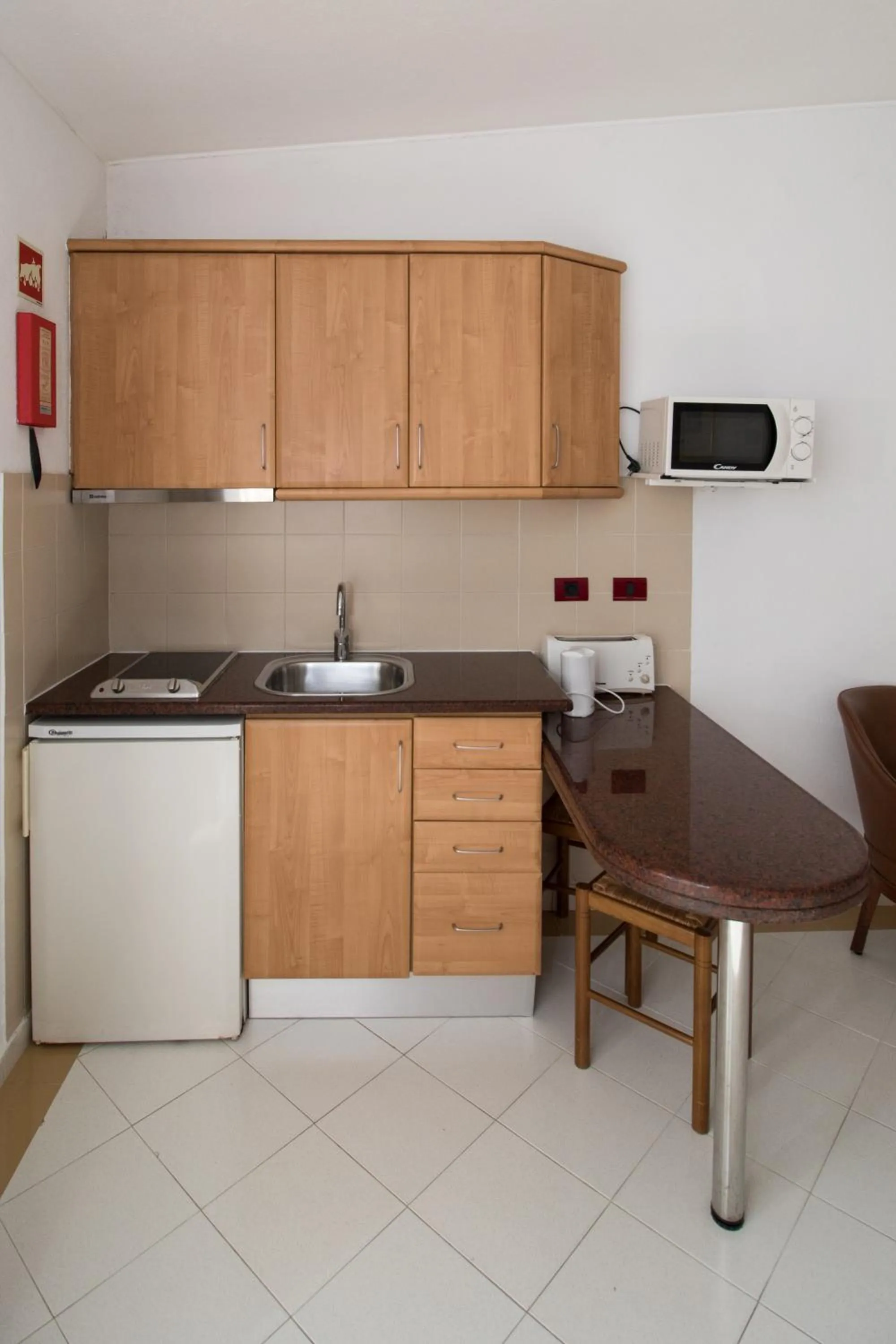 Kitchen or kitchenette in Hotel Apartamento Do Golfe