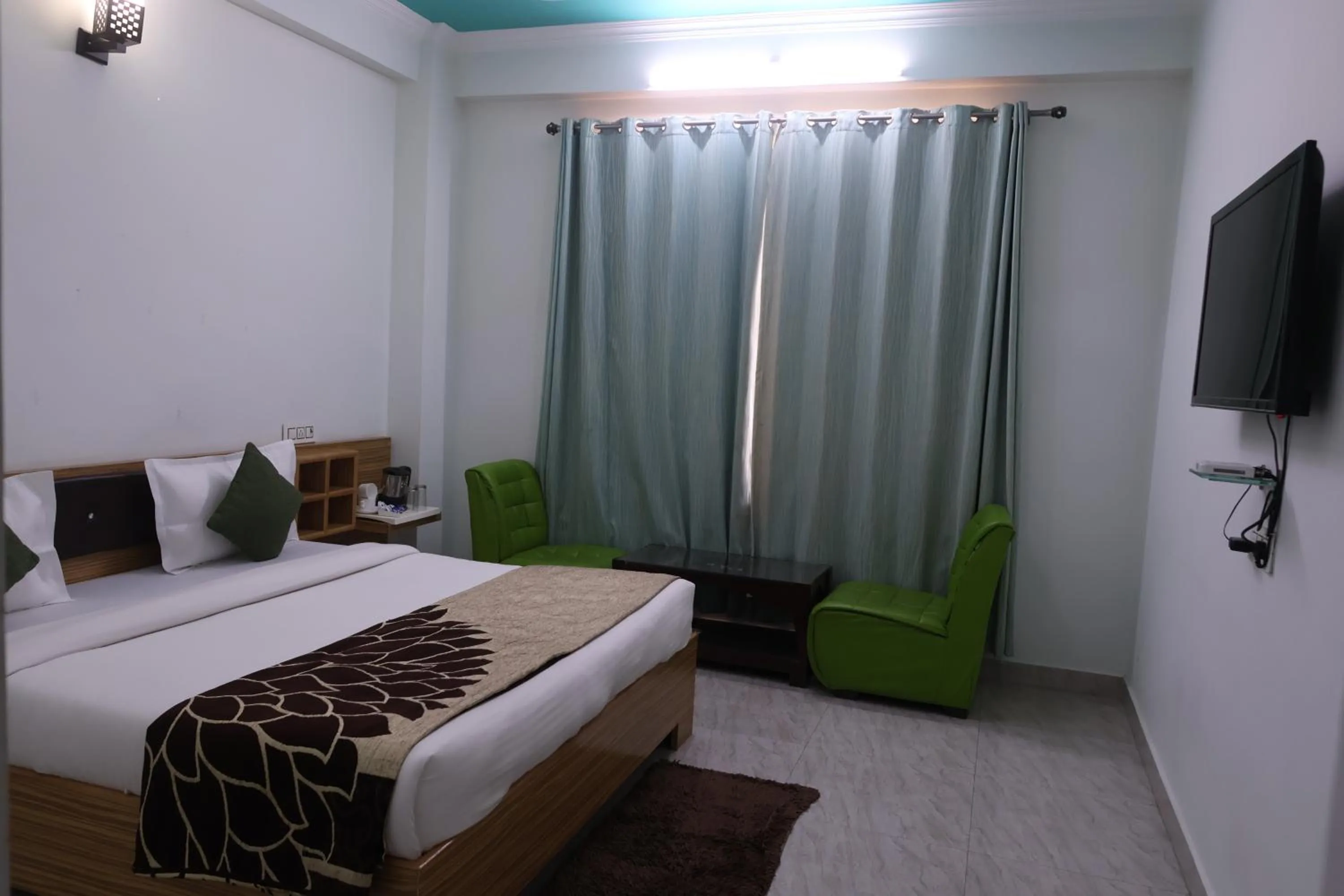 Bedroom, Bed in Hotel Sarla Regency