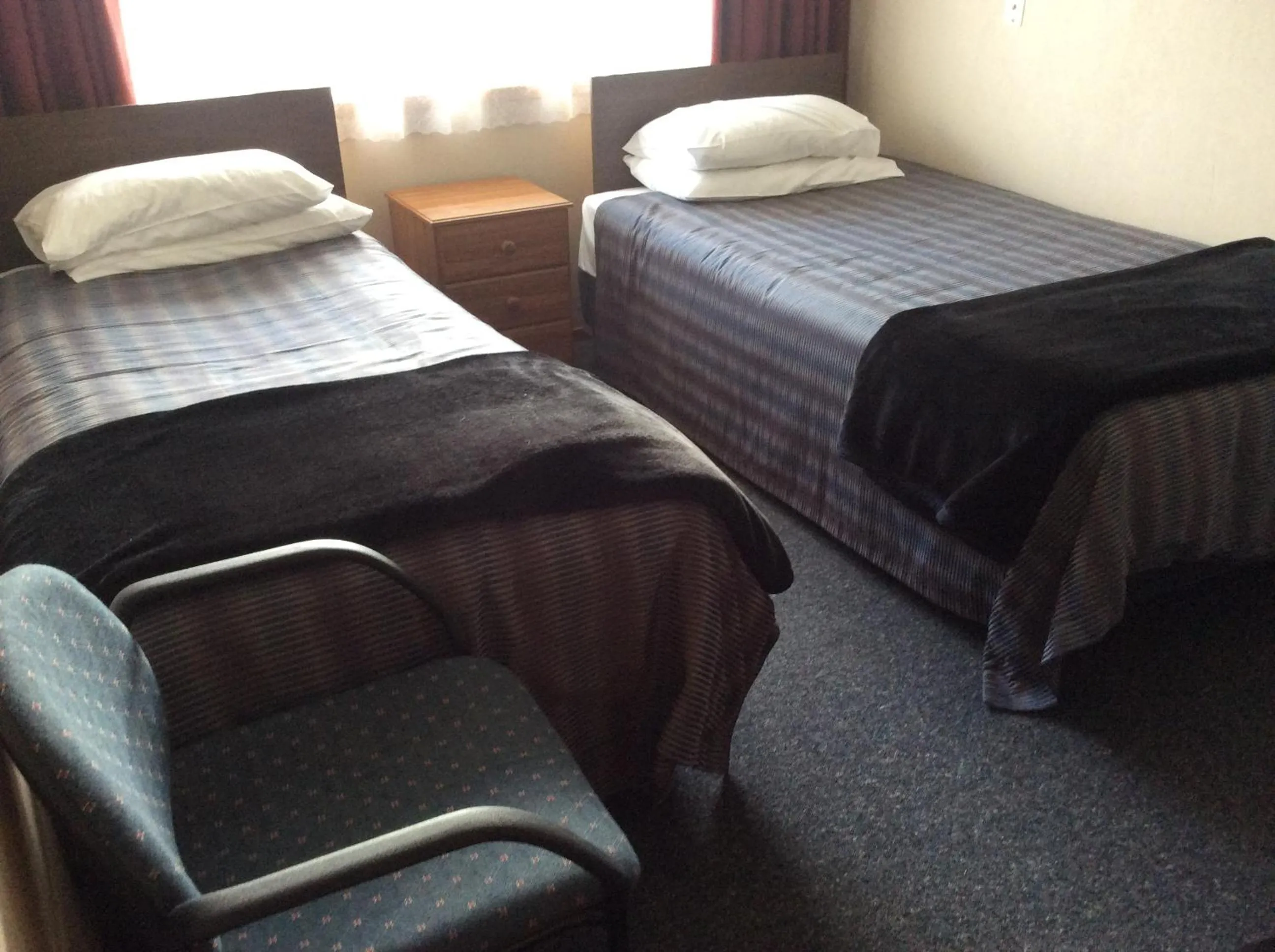 Bed in Charlton Motel