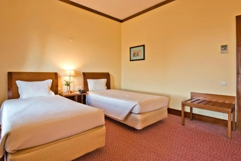 Bed in Golden Tulip Caramulo