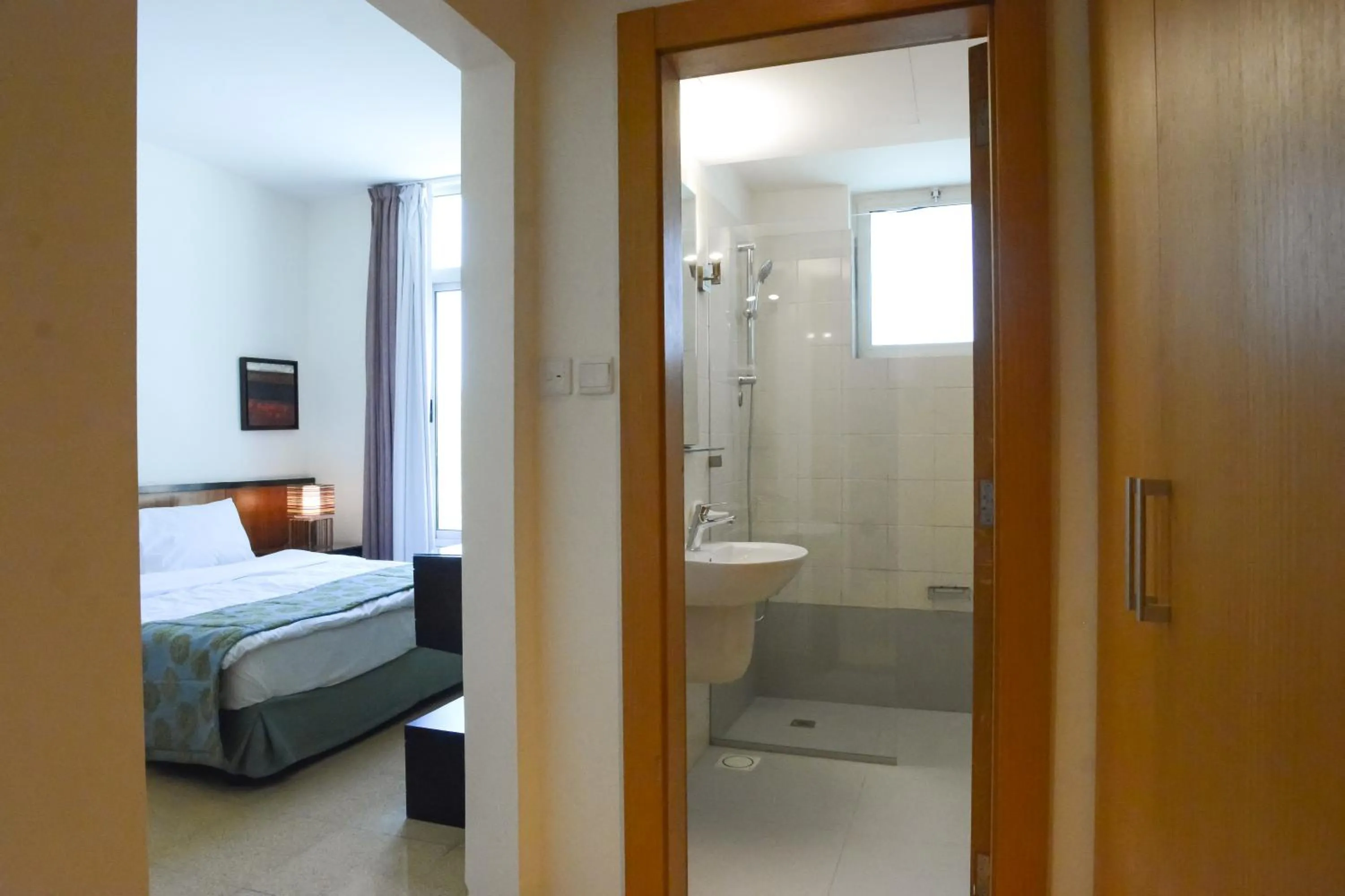 Bed in Burda 41 Hotel & Suites
