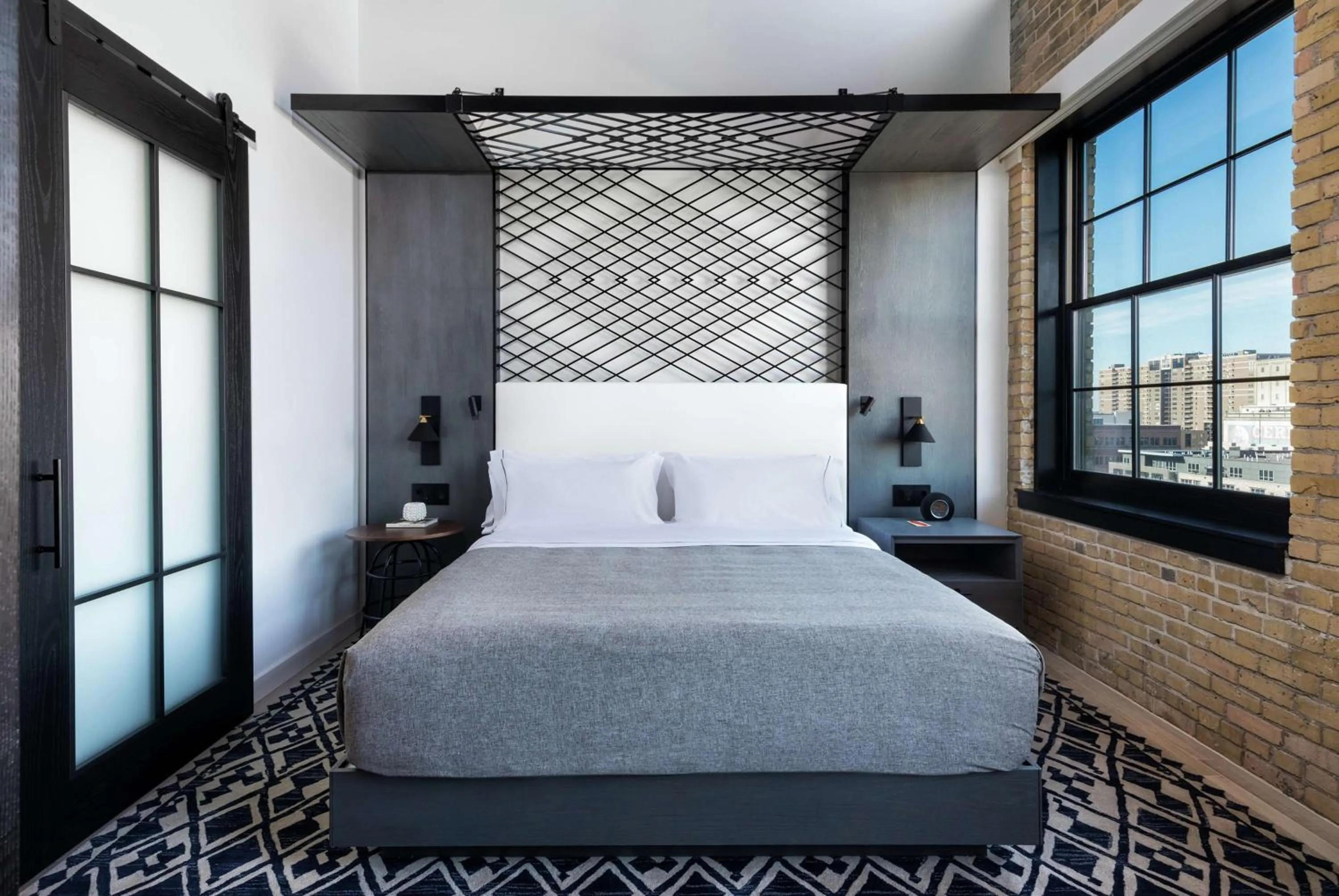 Bed in Canopy by Hilton Minneapolis Mill District