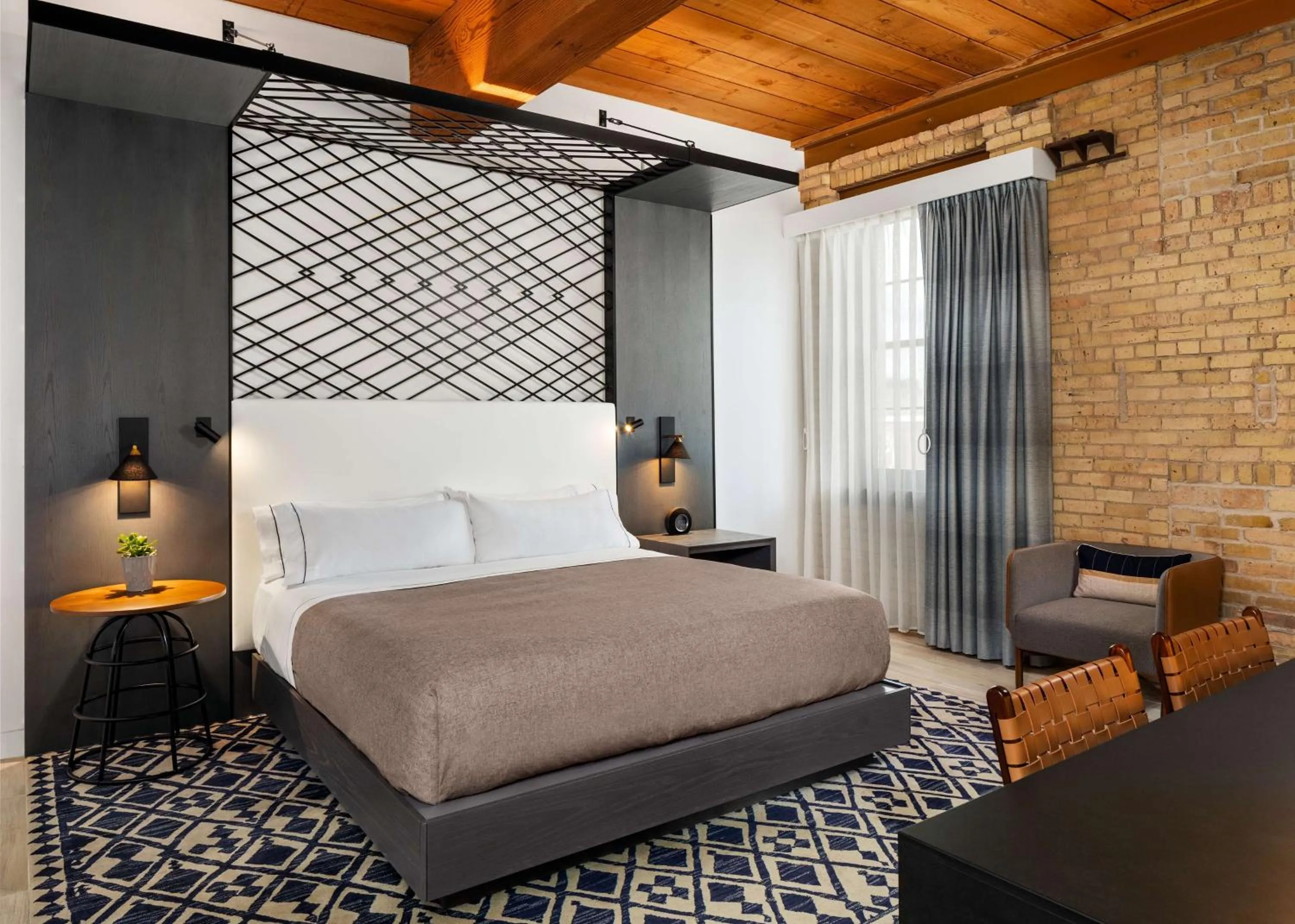 Bed in Canopy by Hilton Minneapolis Mill District
