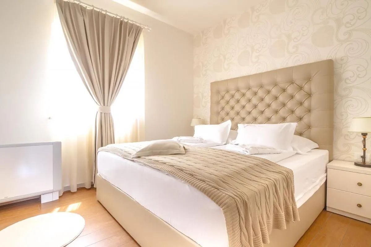 Bed in Luxury Apartments Villa Luce