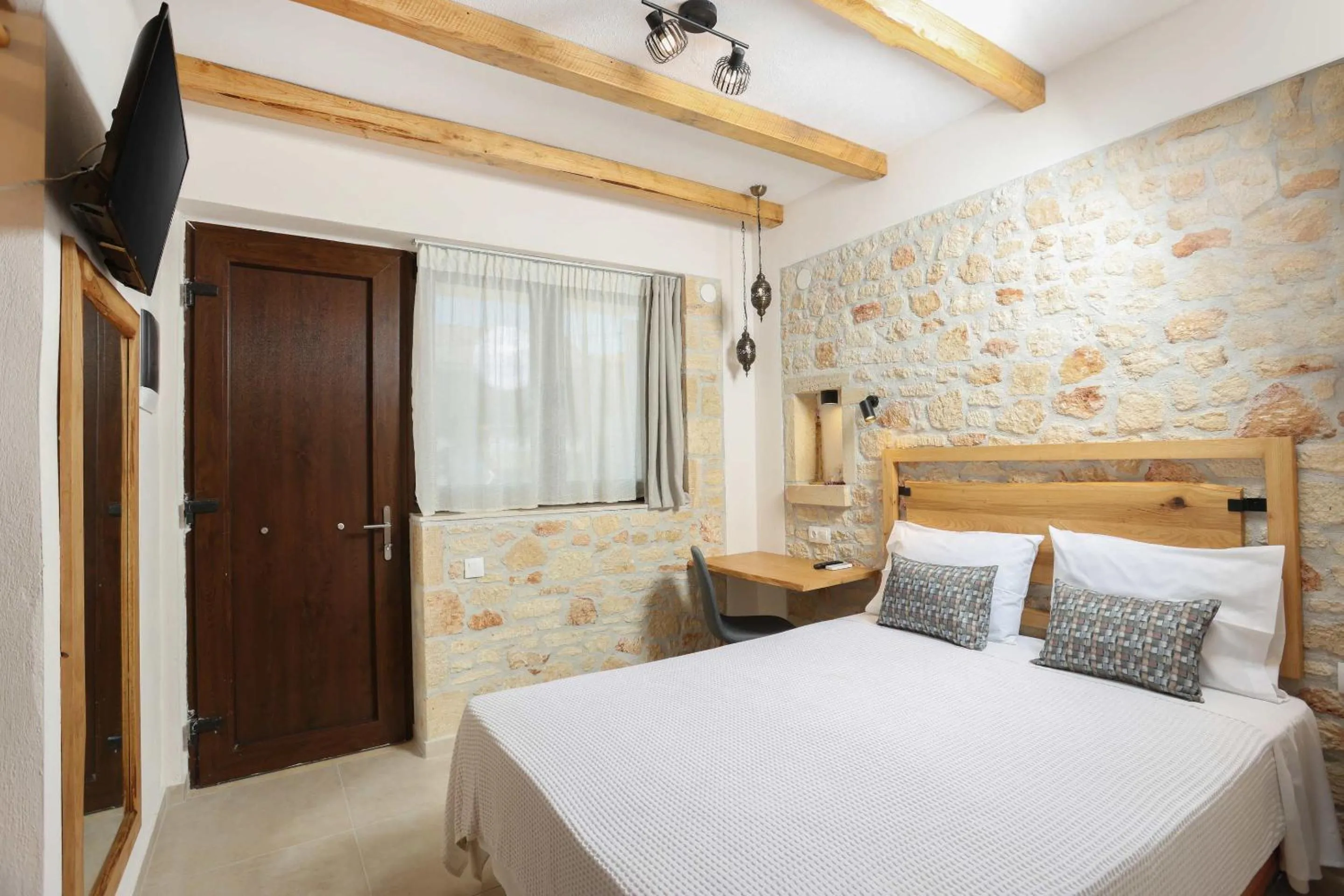 Bed in Agrielia Apartments
