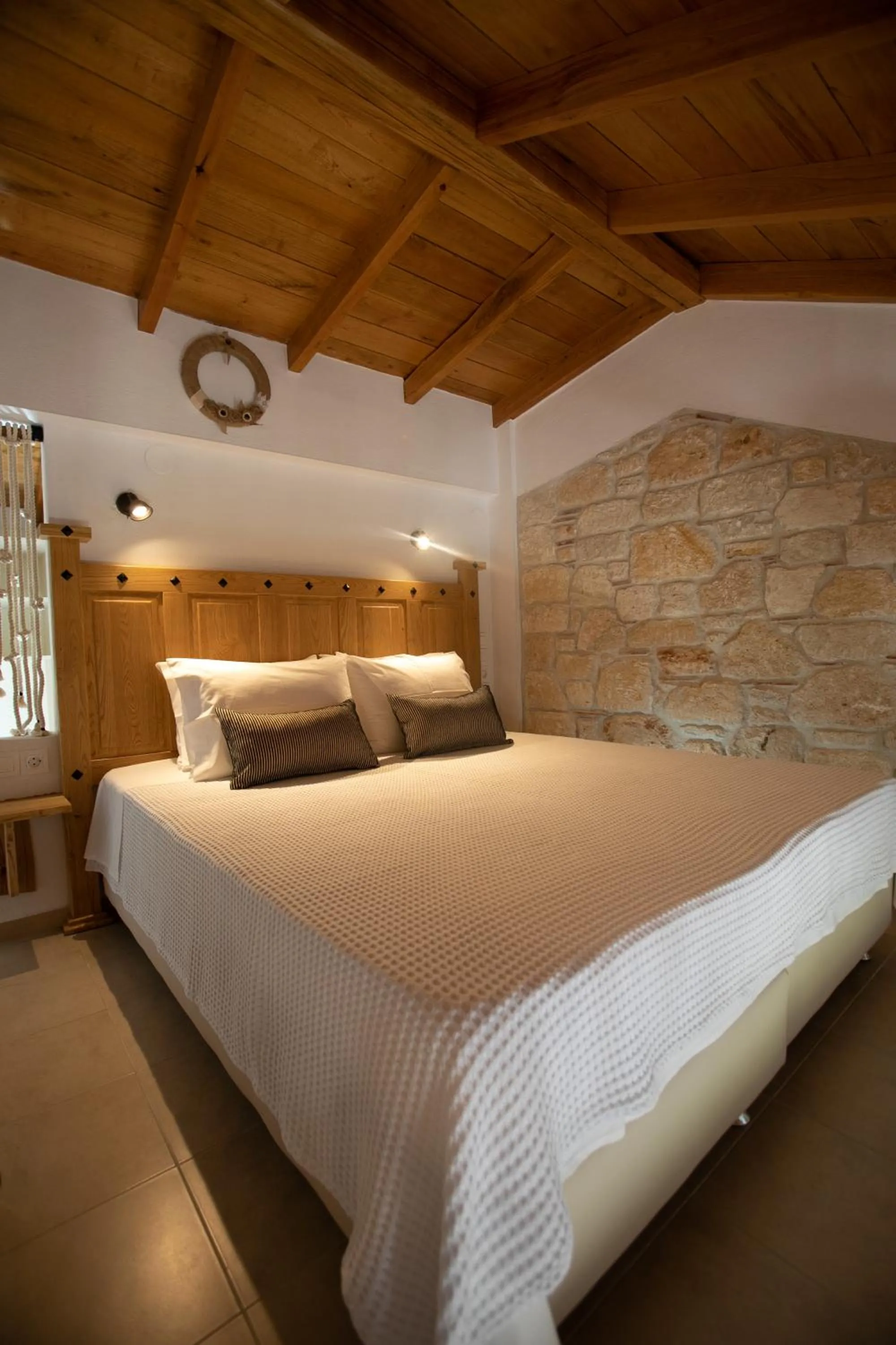 Bed in Agrielia Apartments