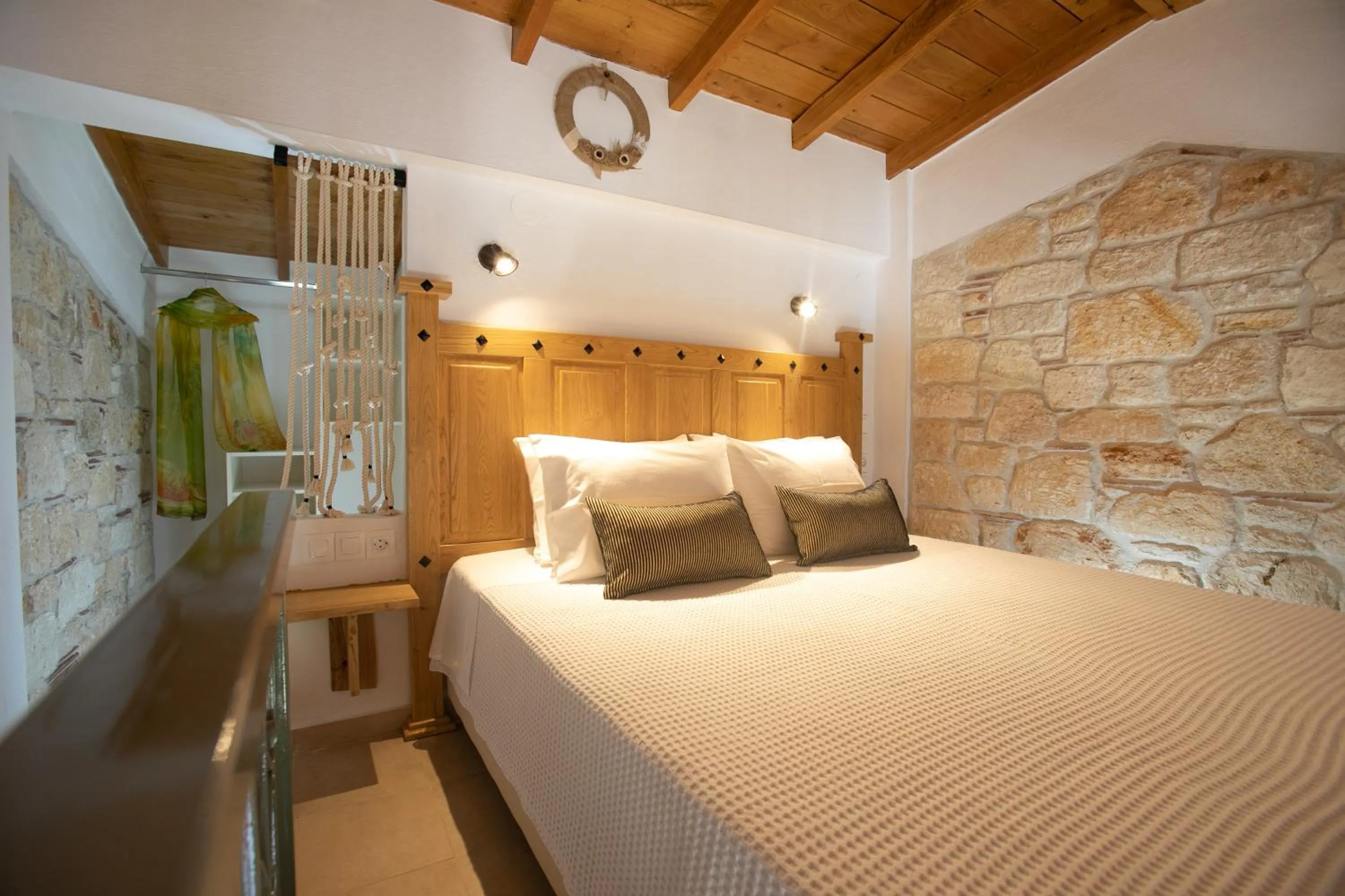 Bed in Agrielia Apartments