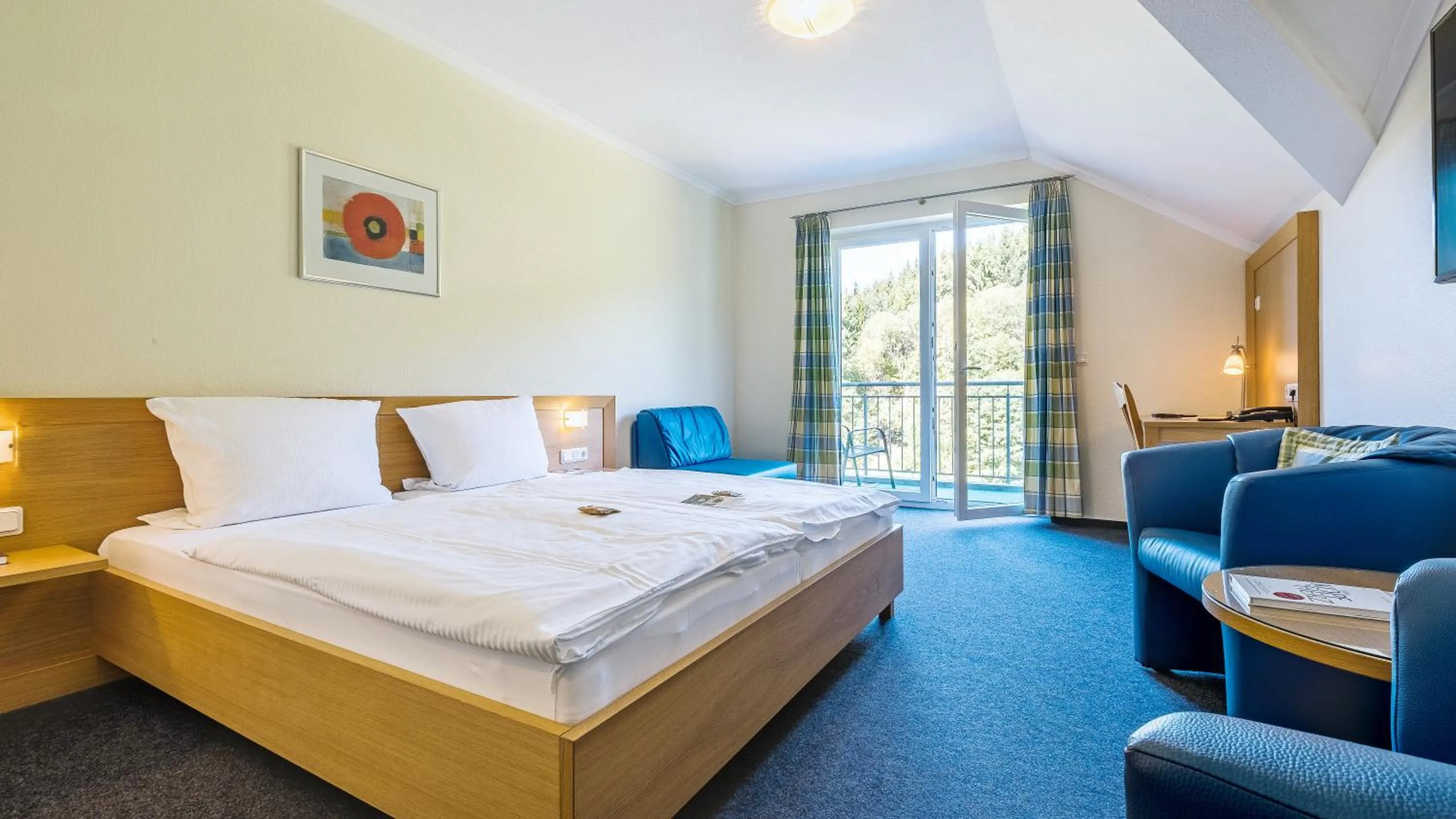 Photo of the whole room, Bed in Dorint Parkhotel Siegen