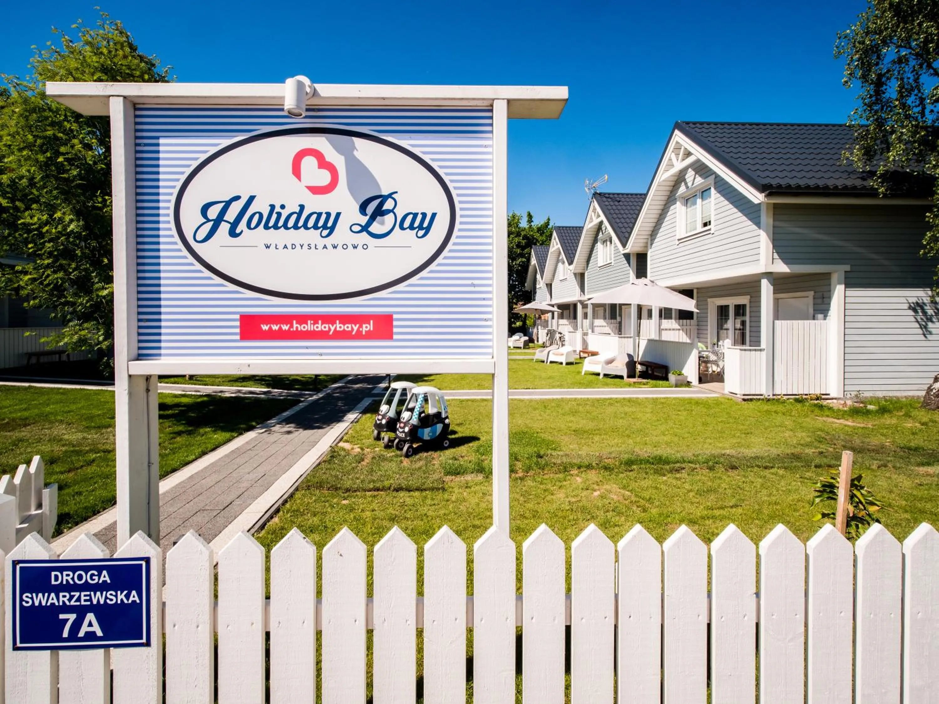Property logo or sign in Holiday Bay