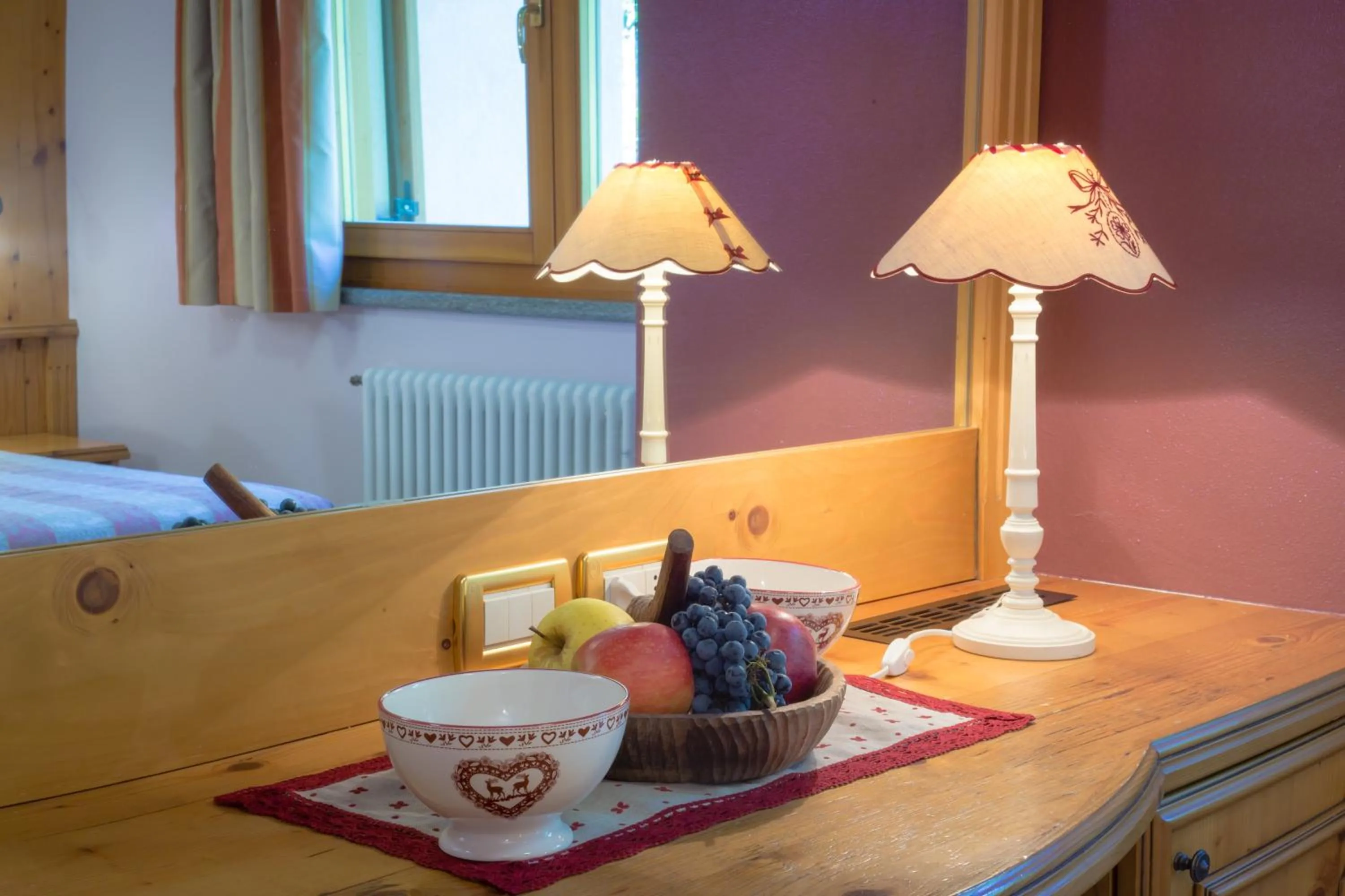 Decorative detail, Bed in Hotel Lo Fleyé