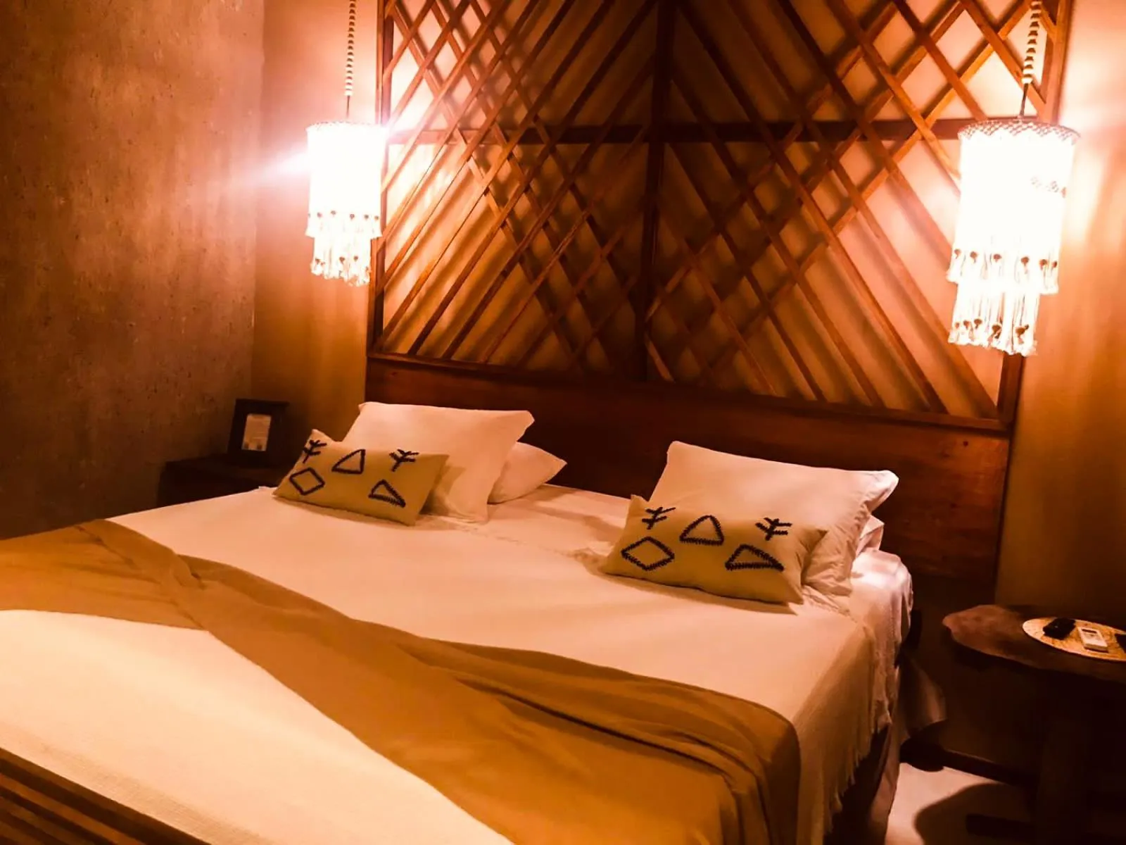 Bed in Aloha Village Bangalôs