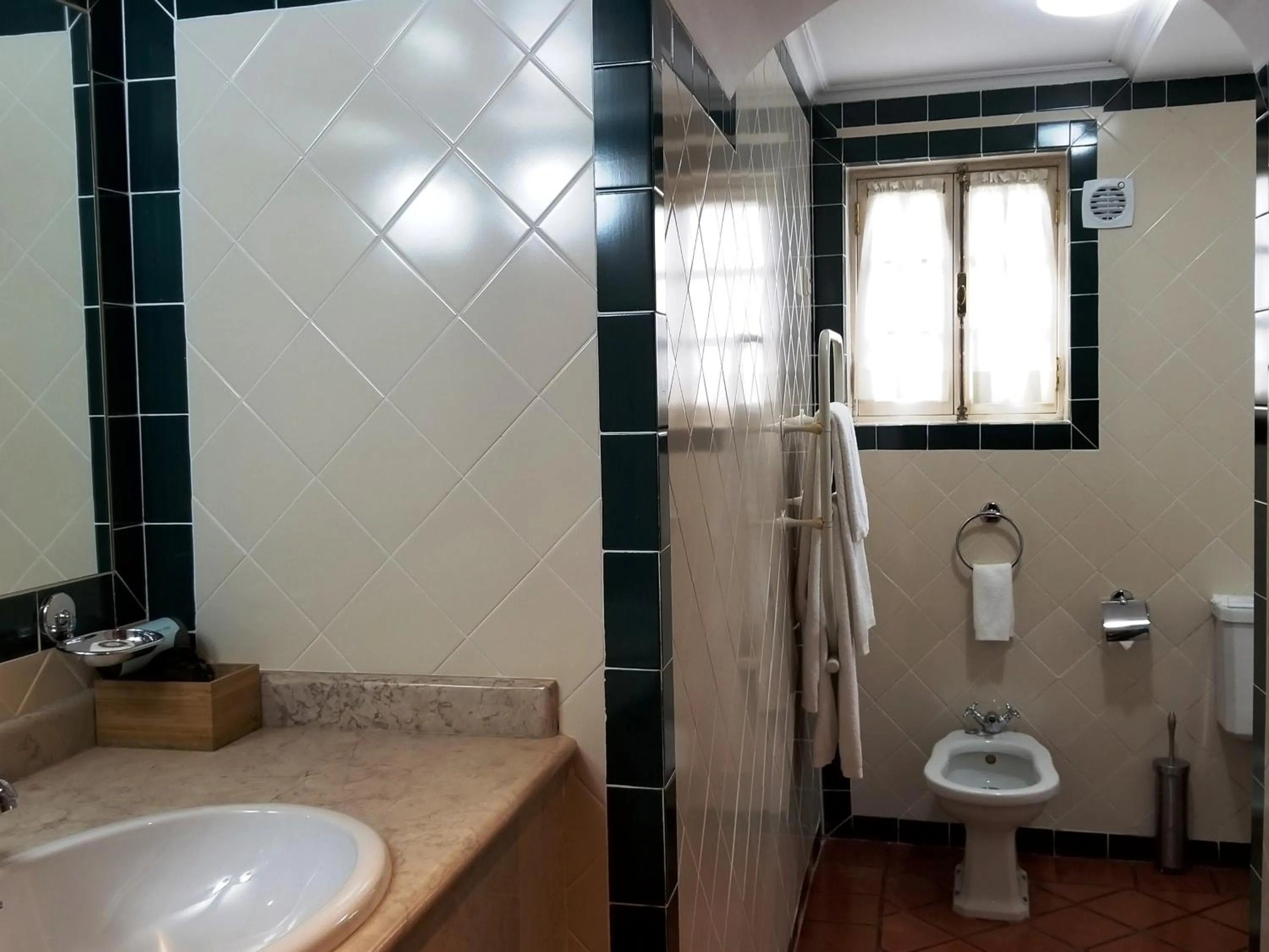 Bathroom in Lawrences Hotel