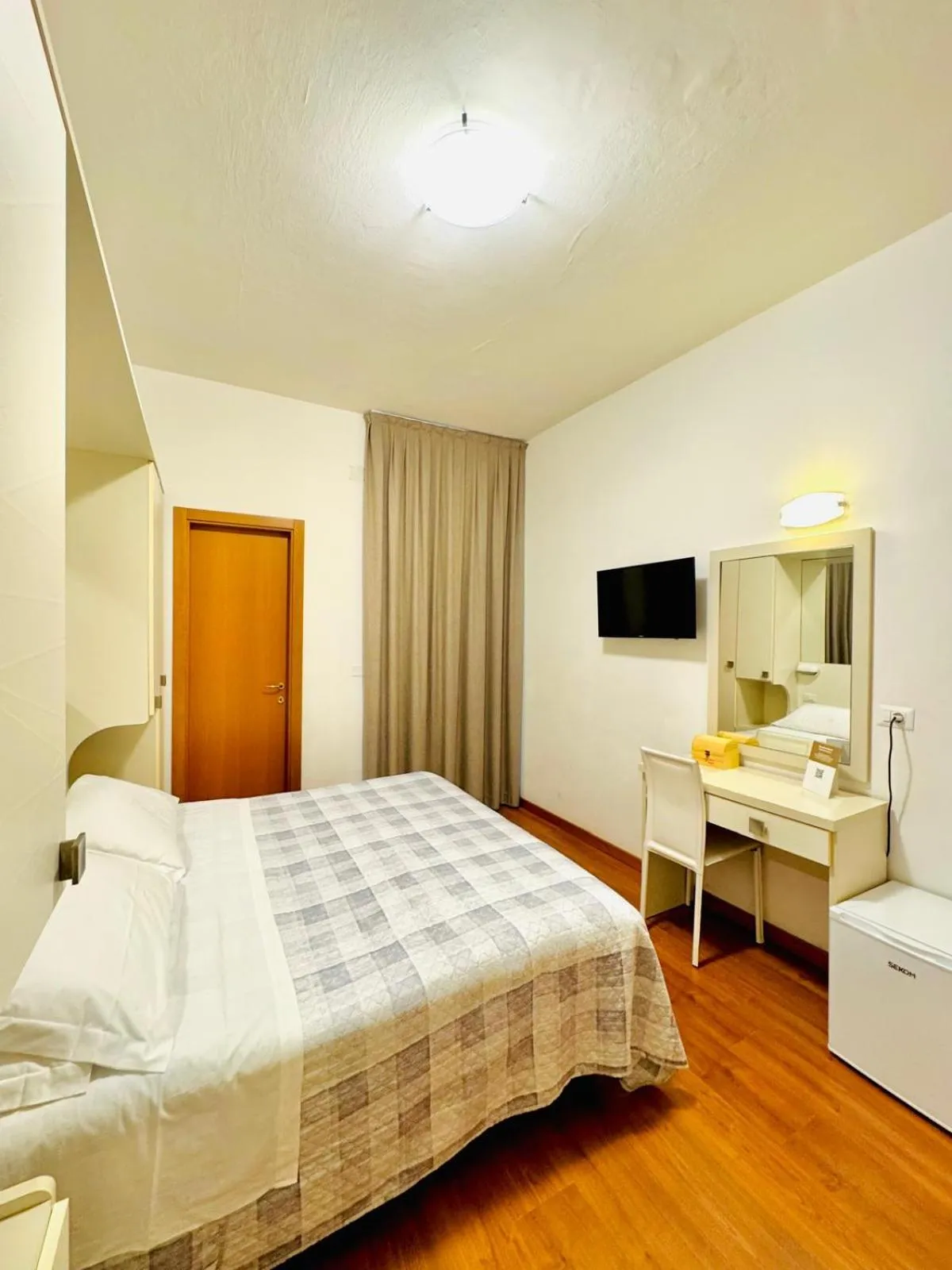 Bed in Hotel Butterfly Wellness & Spa