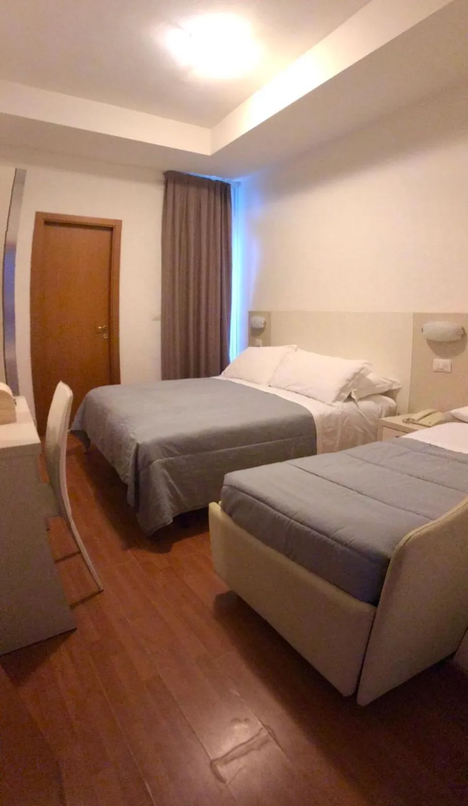 Bed in Hotel Butterfly Wellness & Spa