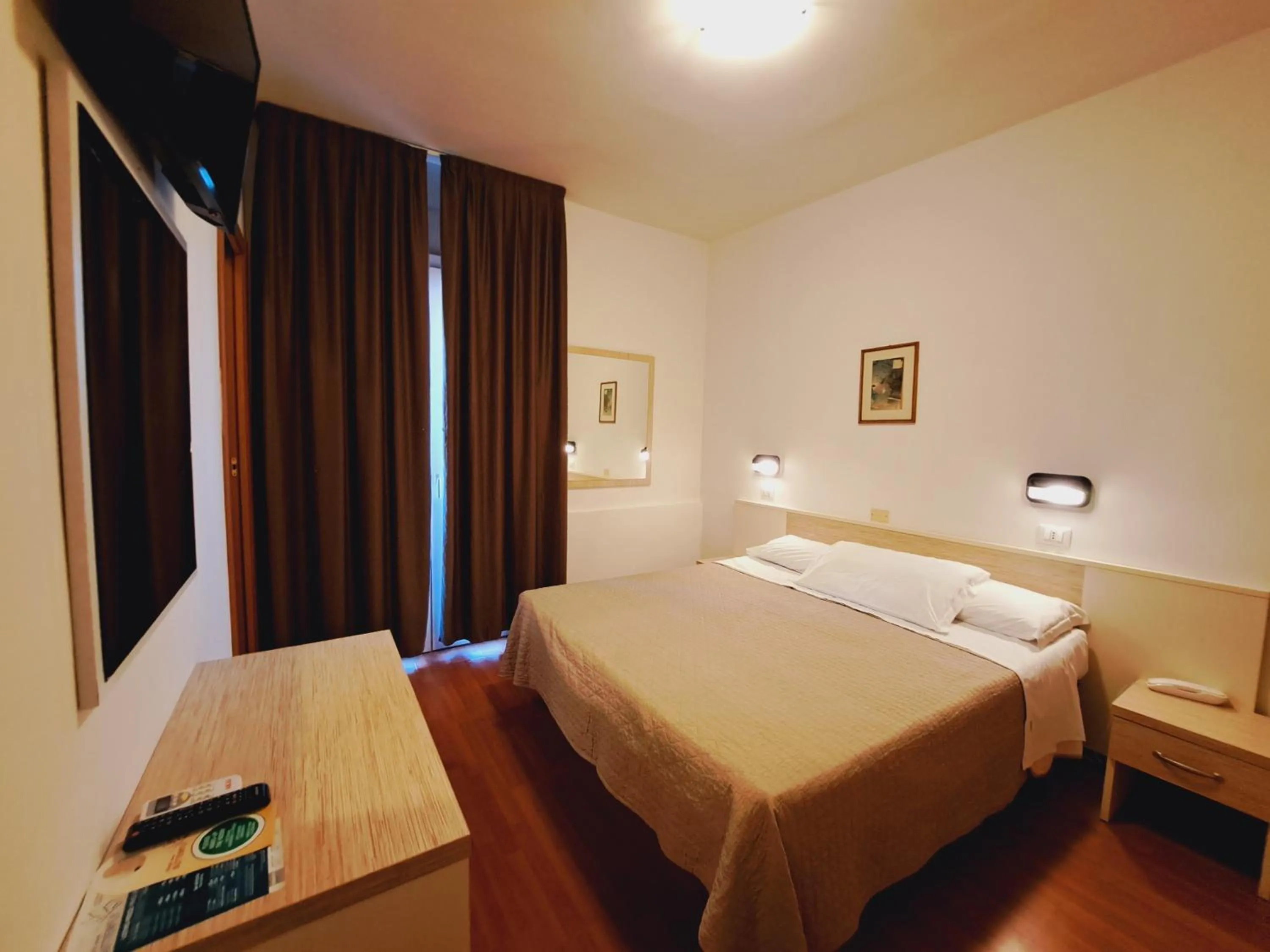 Bed in Hotel Butterfly Wellness & Spa