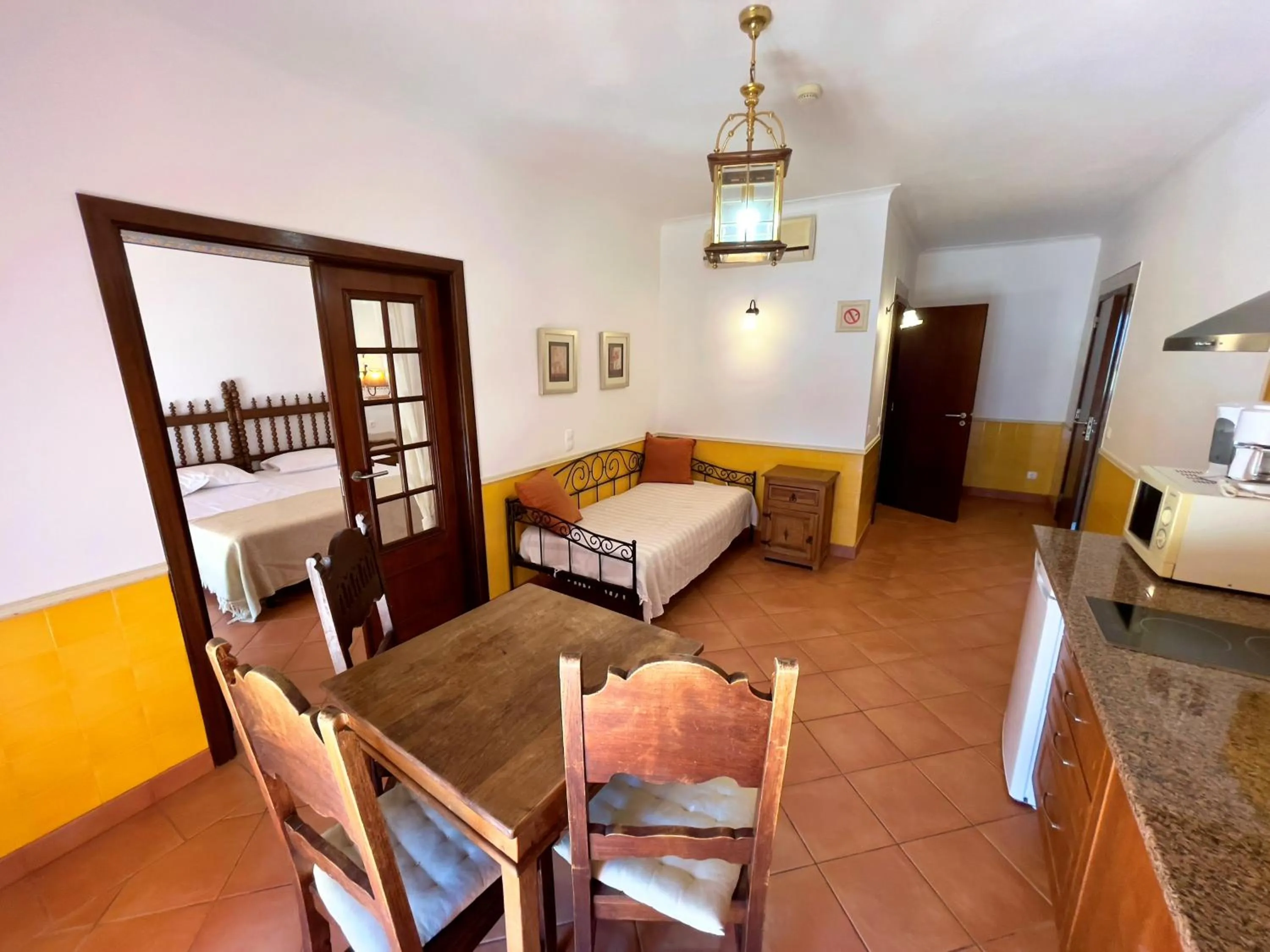 Kitchen or kitchenette, Bed in Quinta do Mar - Country & Sea Village