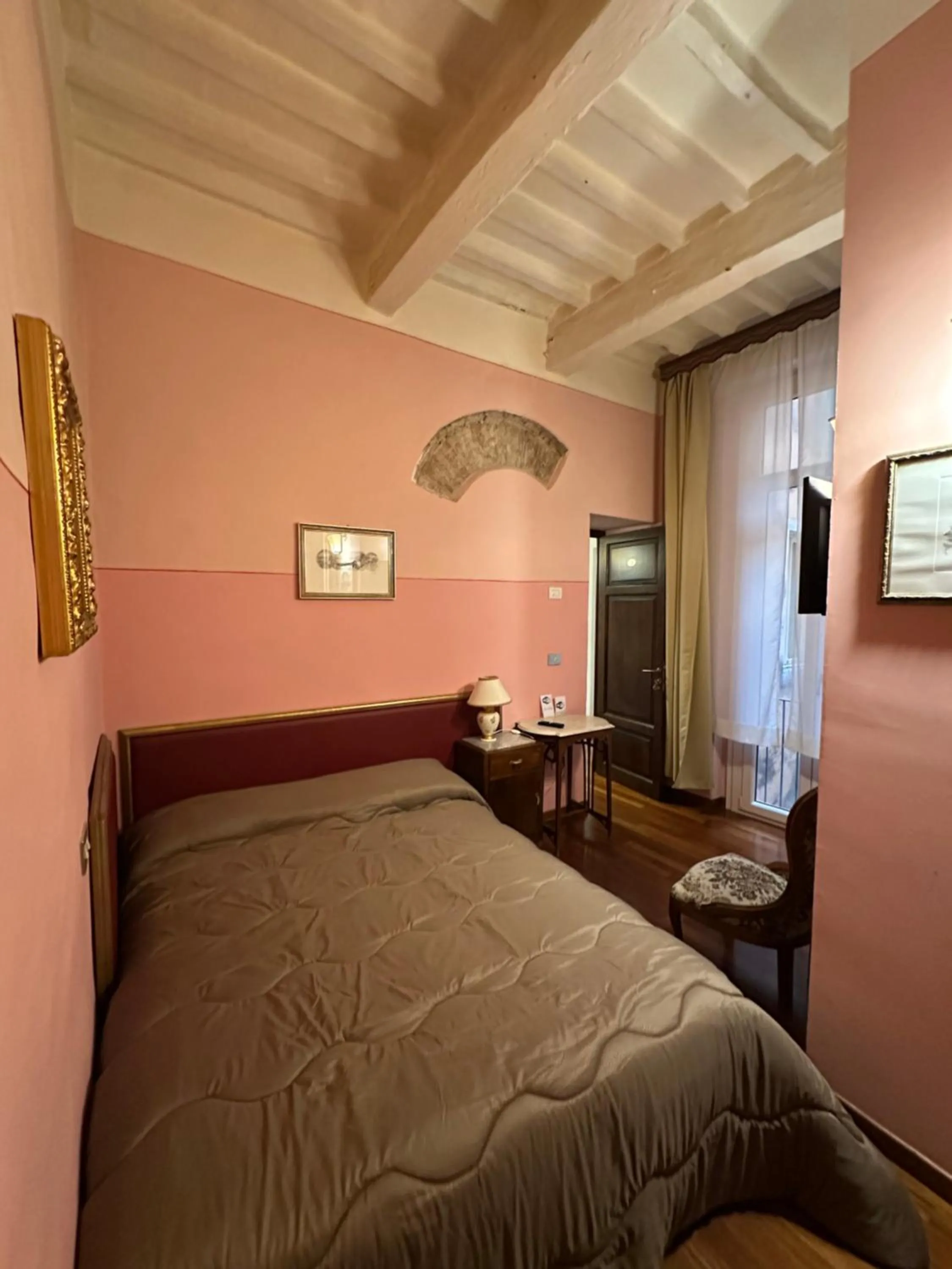 Photo of the whole room, Bed in Locanda Guidi